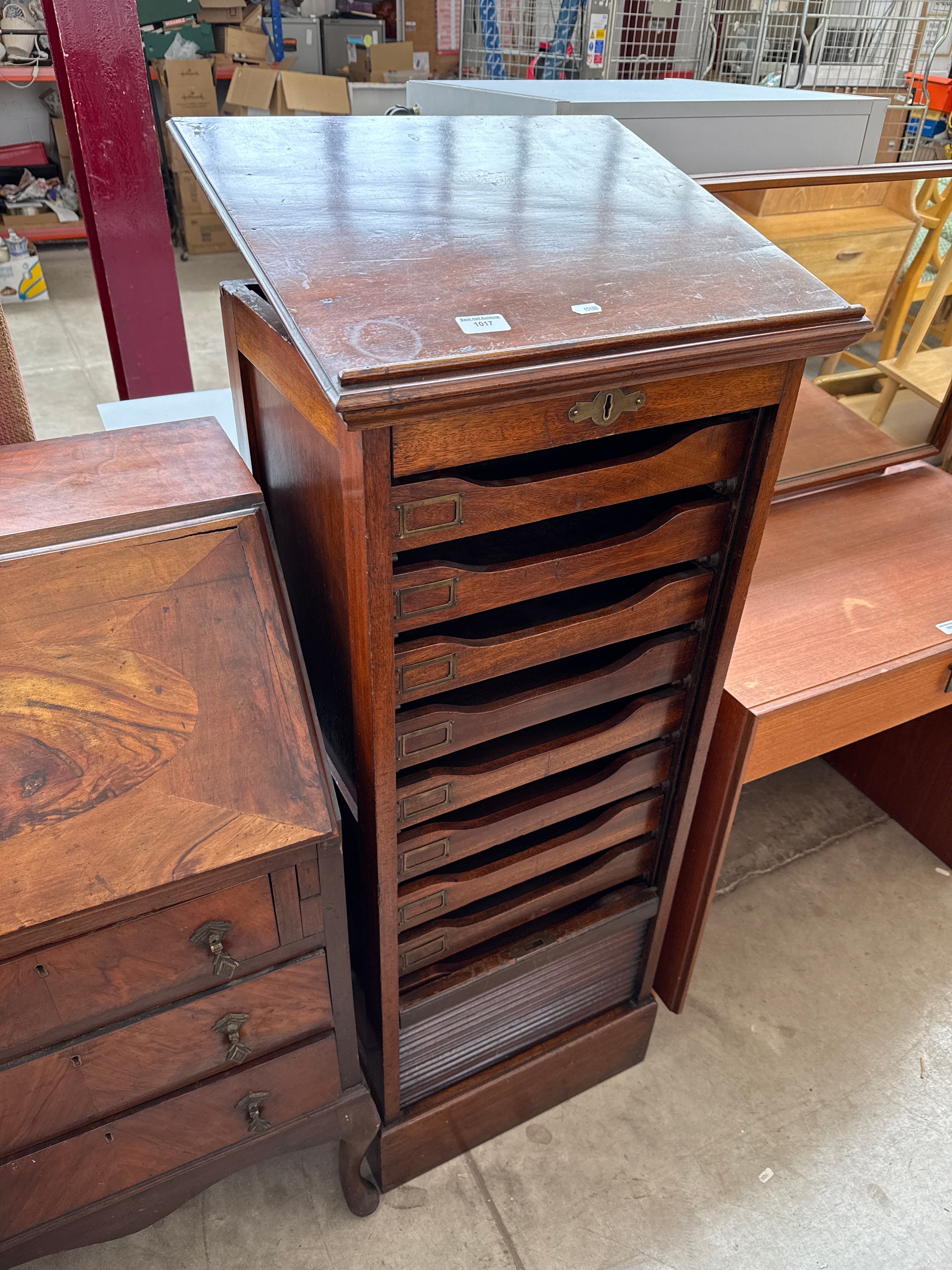 A vintage mahogany tambour fronted 10 drawer lectern/filing cabinet