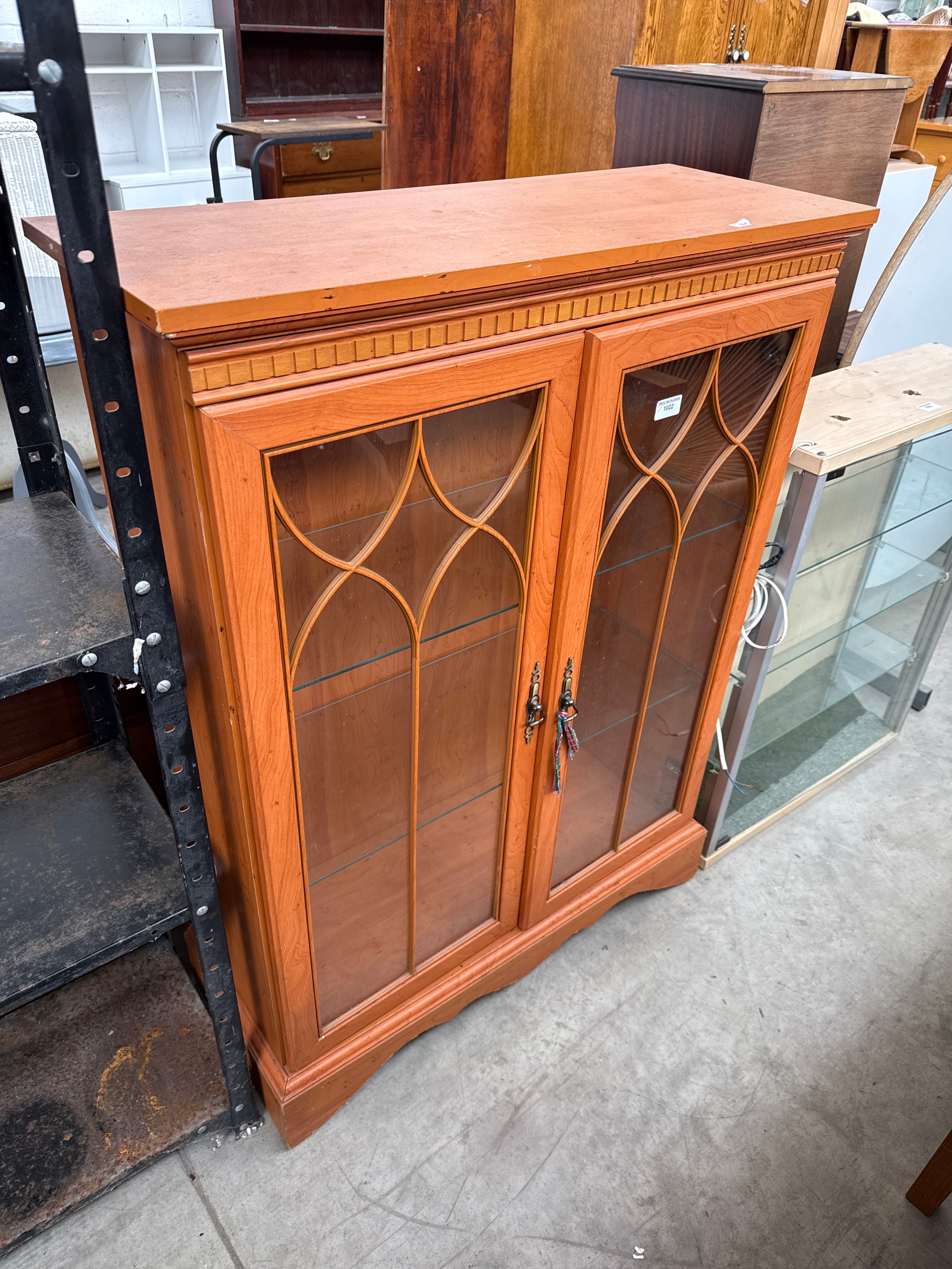 A vintage 2 door glazed cabinet