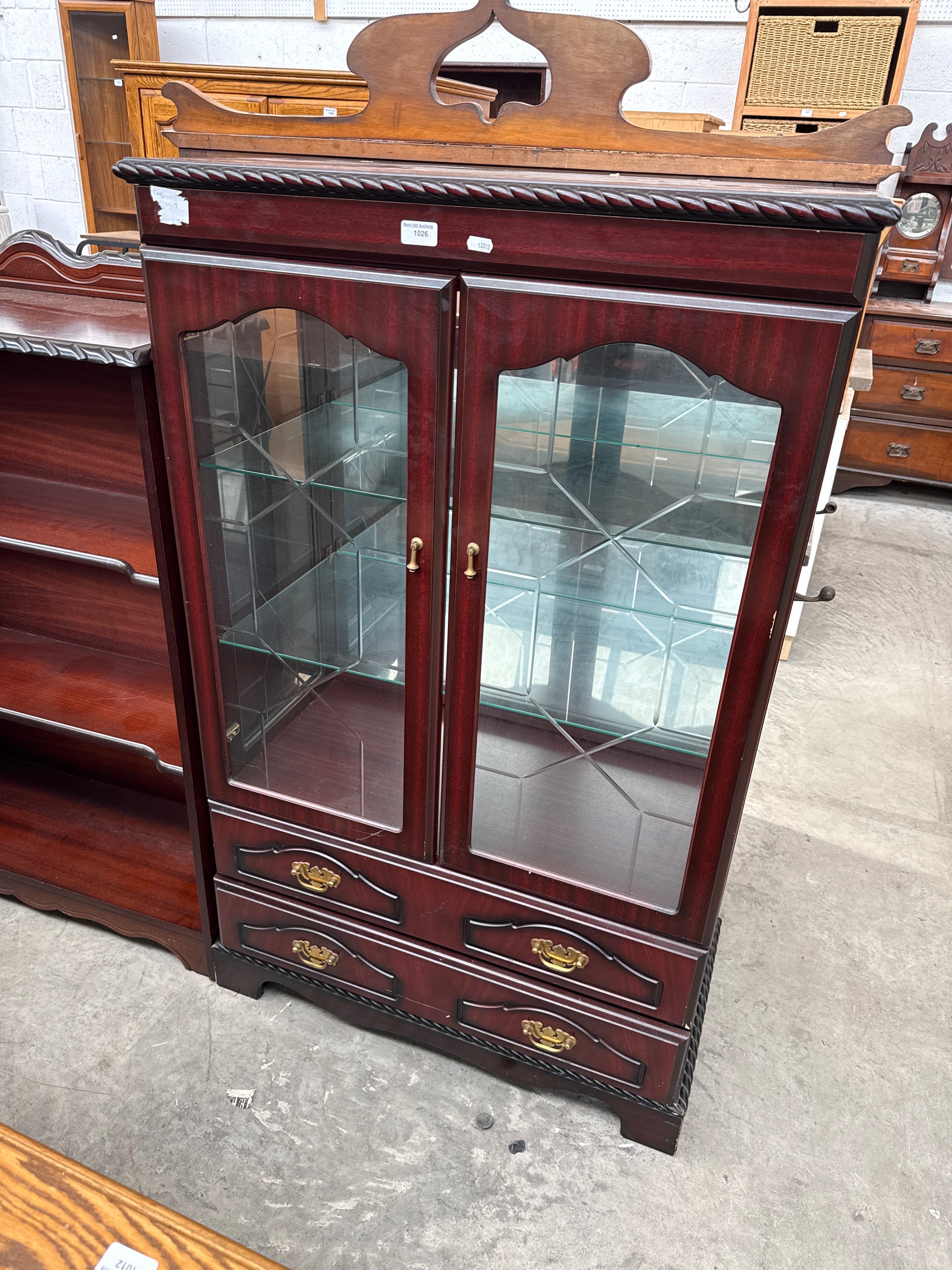 A large vintage mahogany 2 door glazed cabinet with 2 x lower drawers