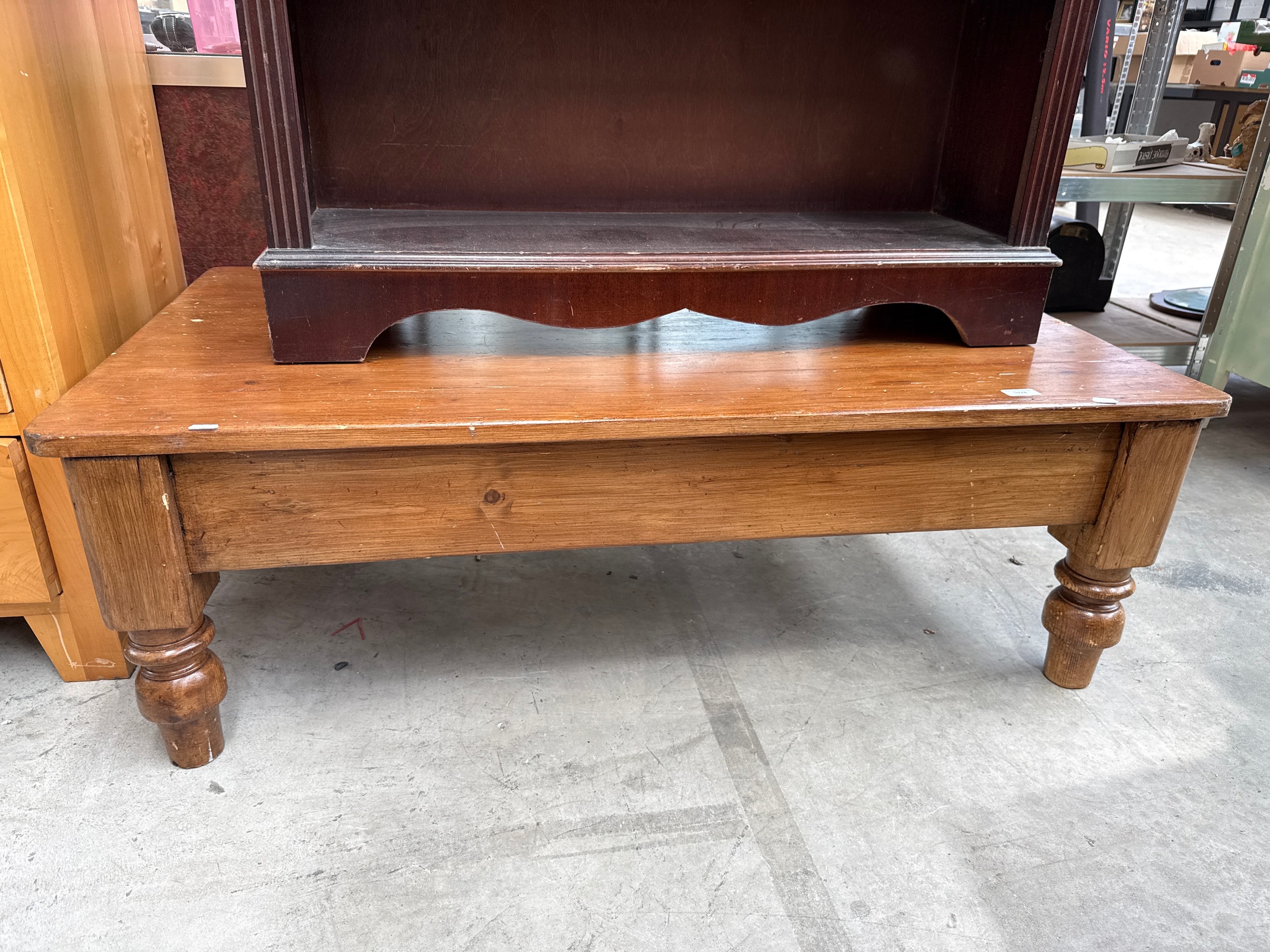 A vintage solid wooden coffee table