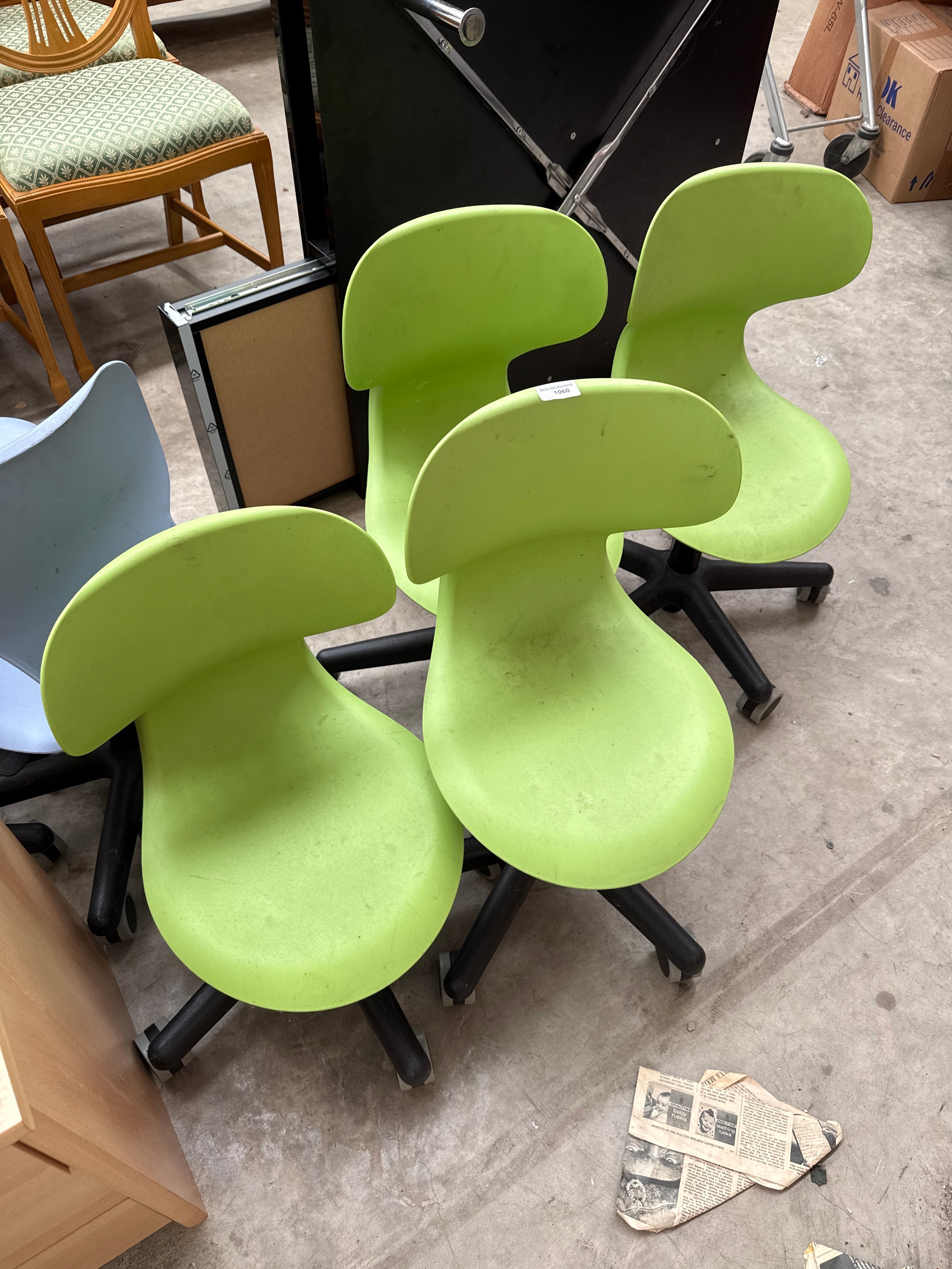 A set of 4 x small plastic seated adjustable swivel chairs