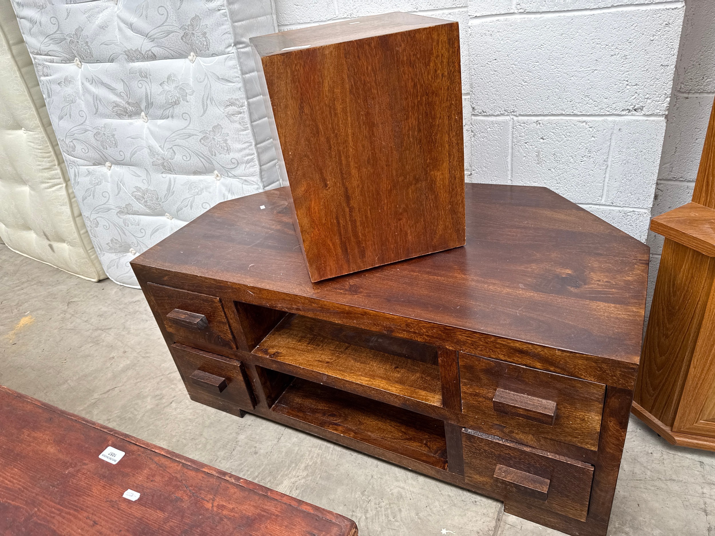 A large hardwood 4 drawer TV stand base unit and a wood block stand