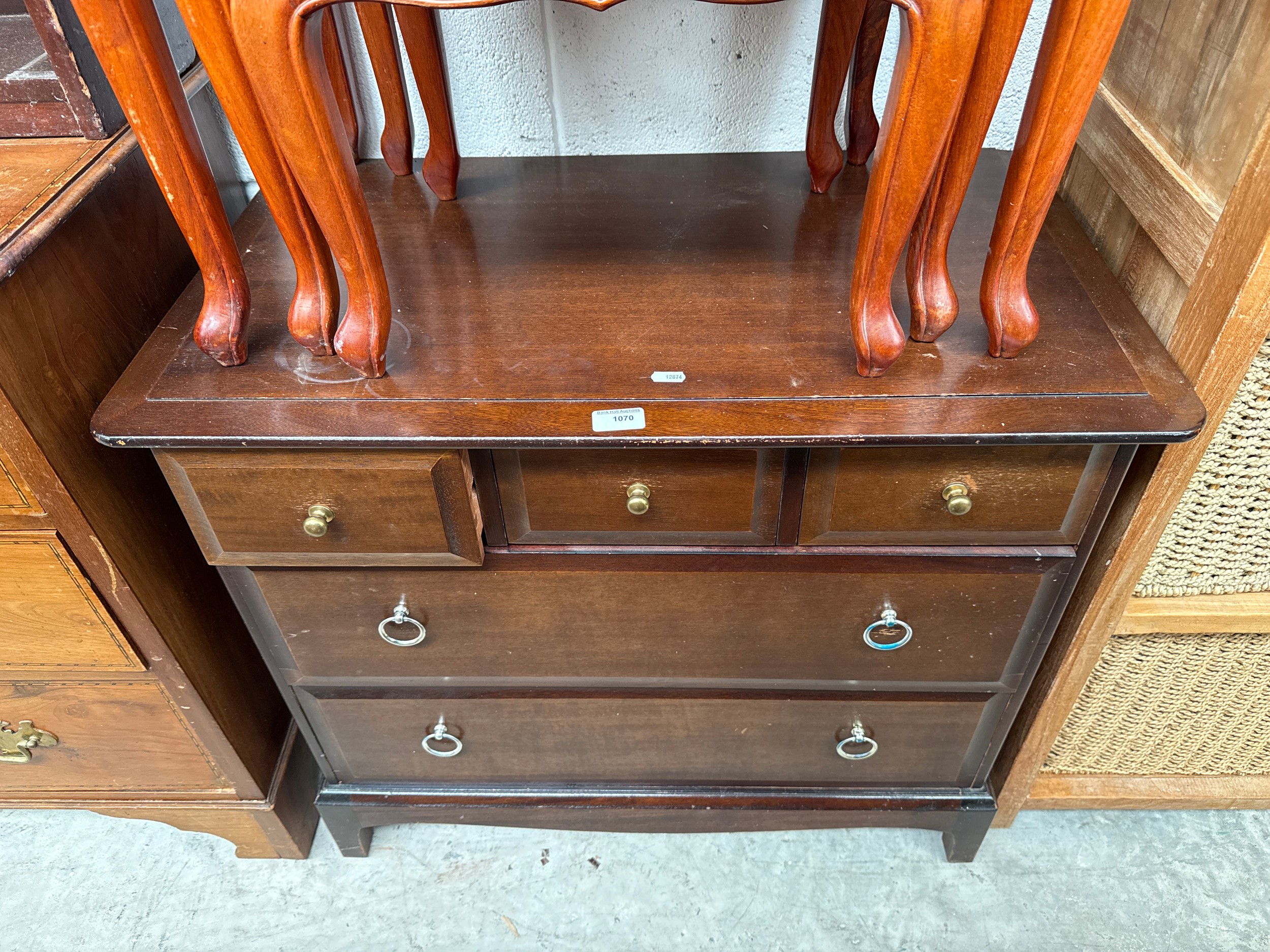 A vintage 3 over 2 drawer STAG mahogany chest