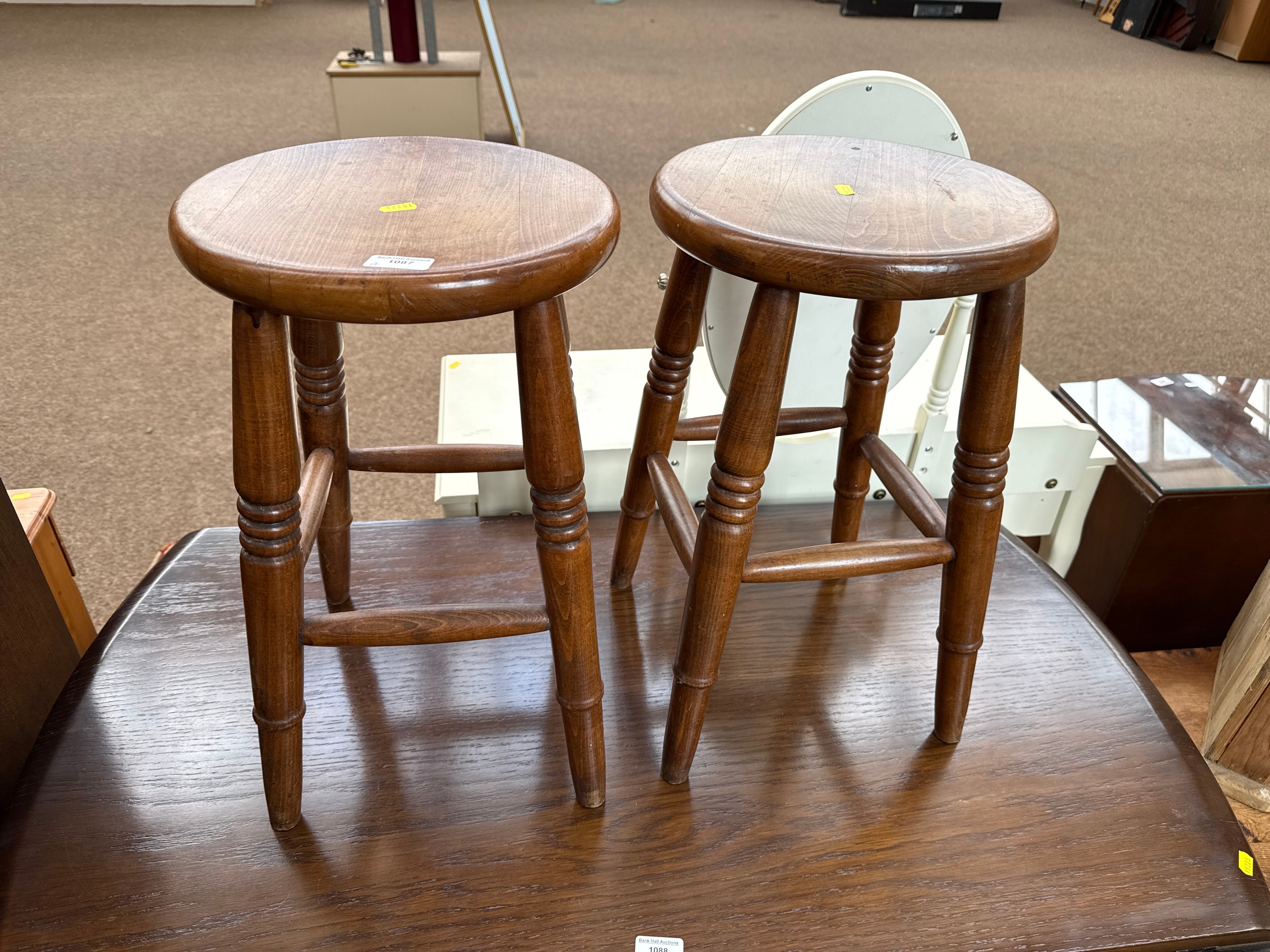 A pair of solid wooden kitchen stools