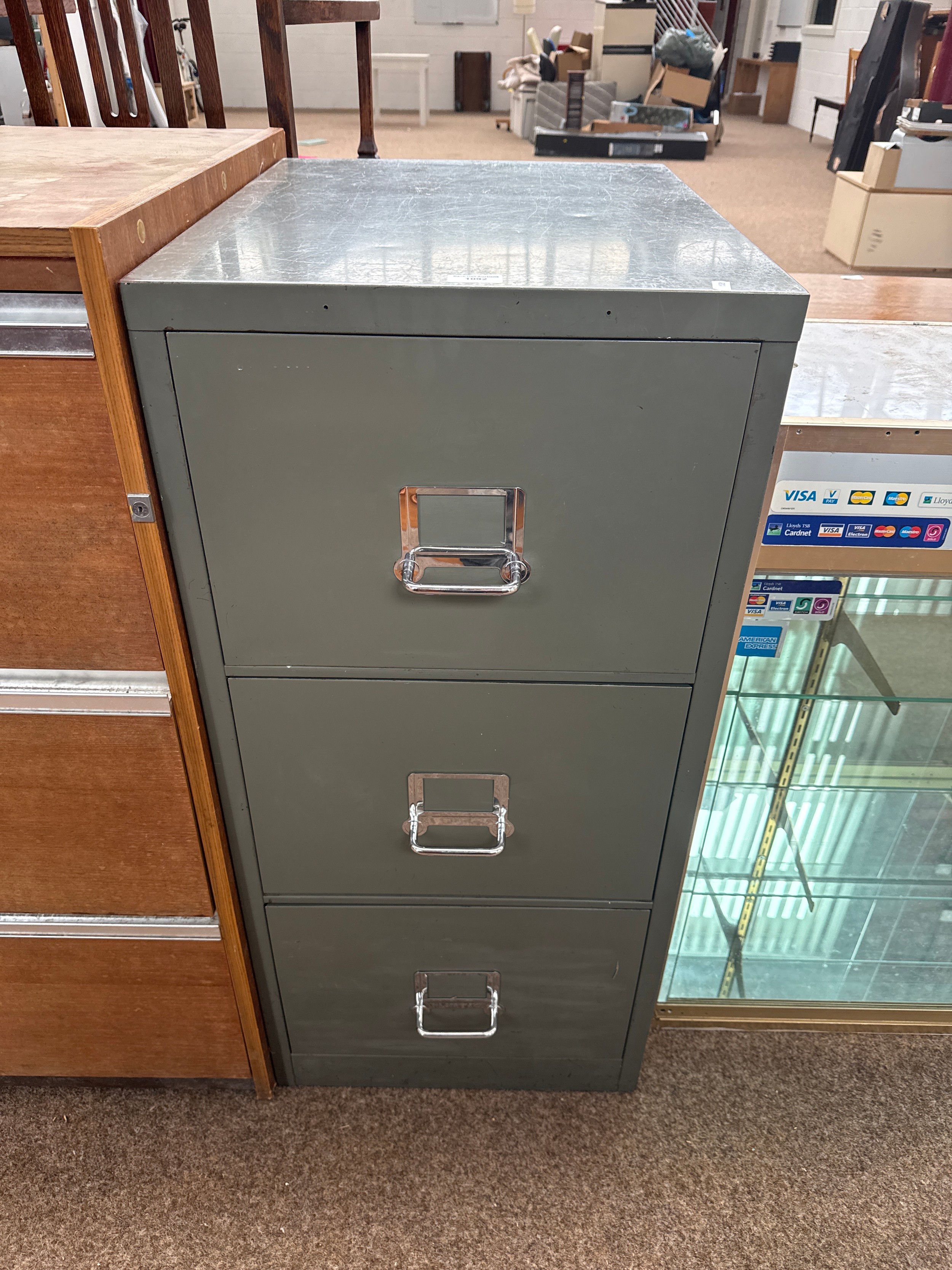 A vintage metal 3 drawer filing cabinet