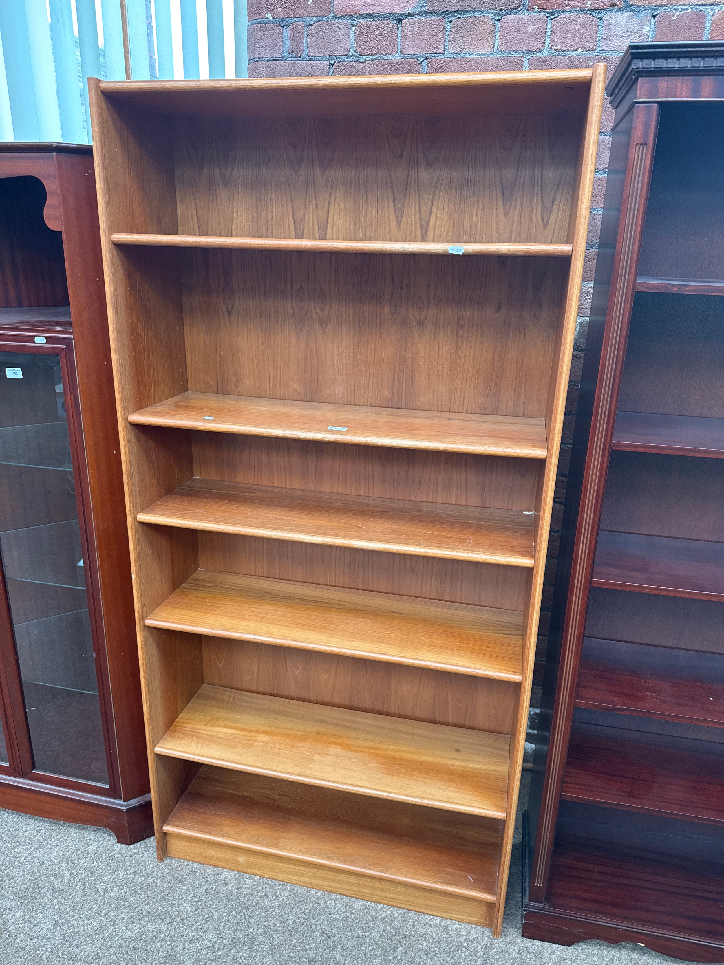 A large 6 tier shelving unit/ bookcase