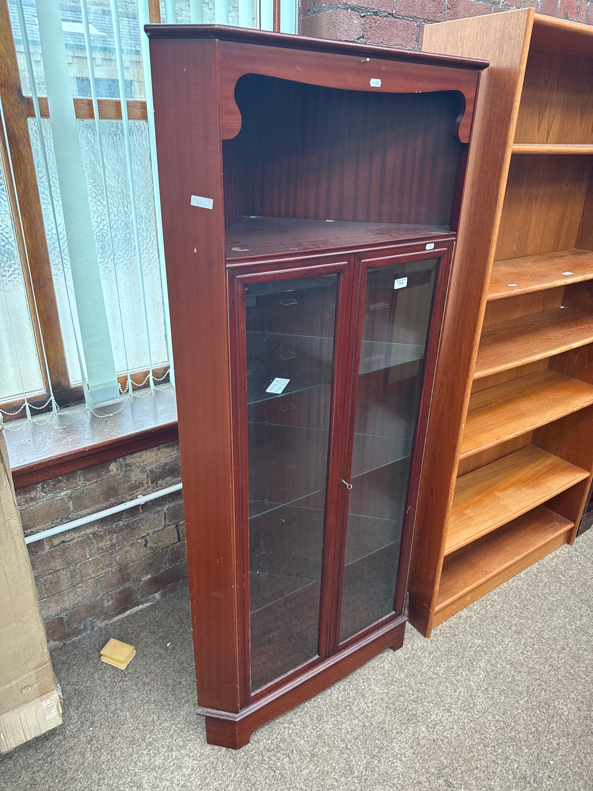 Large corner cabinet with twin glass doors