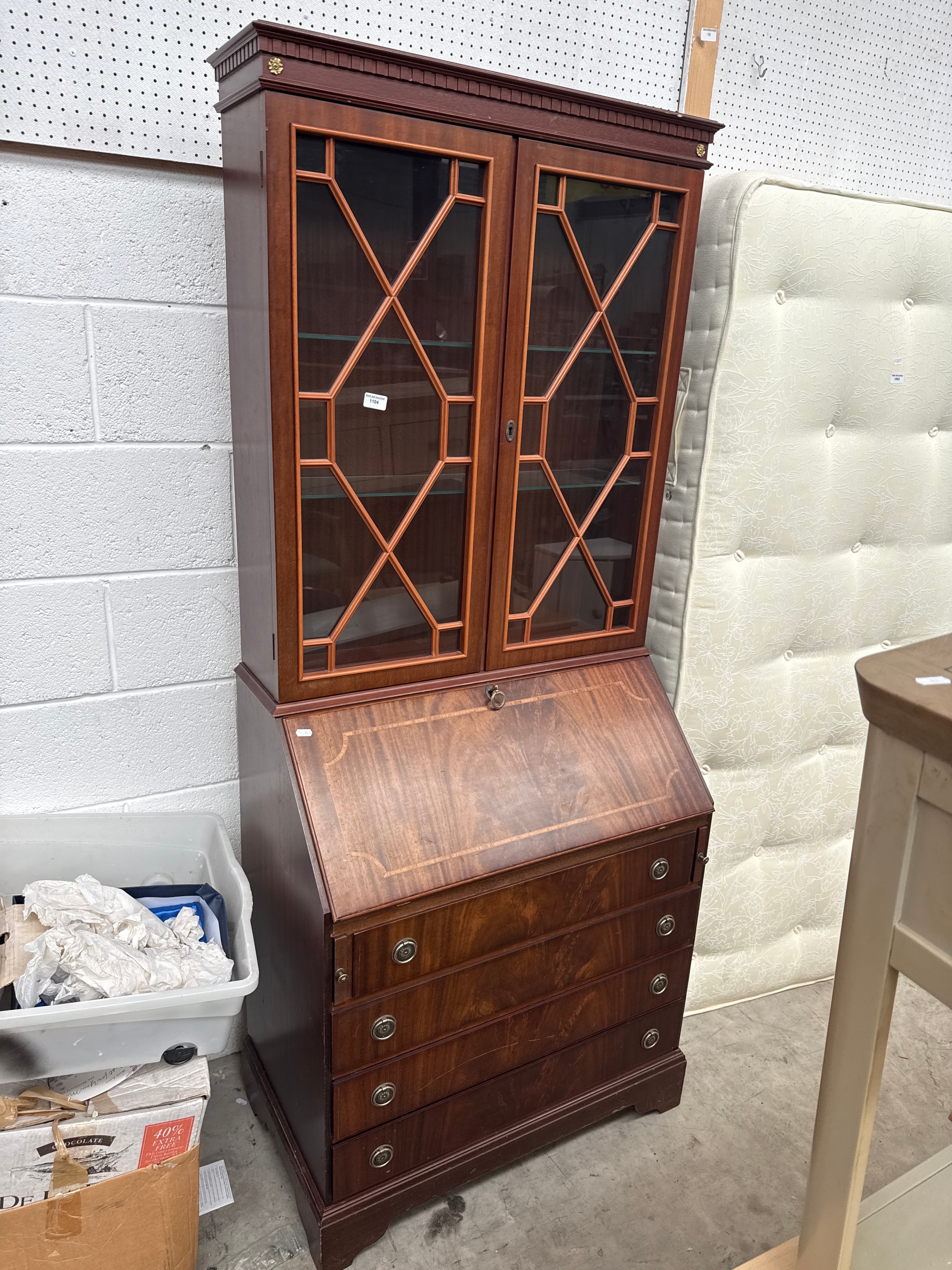 A vintage bureau bookcase