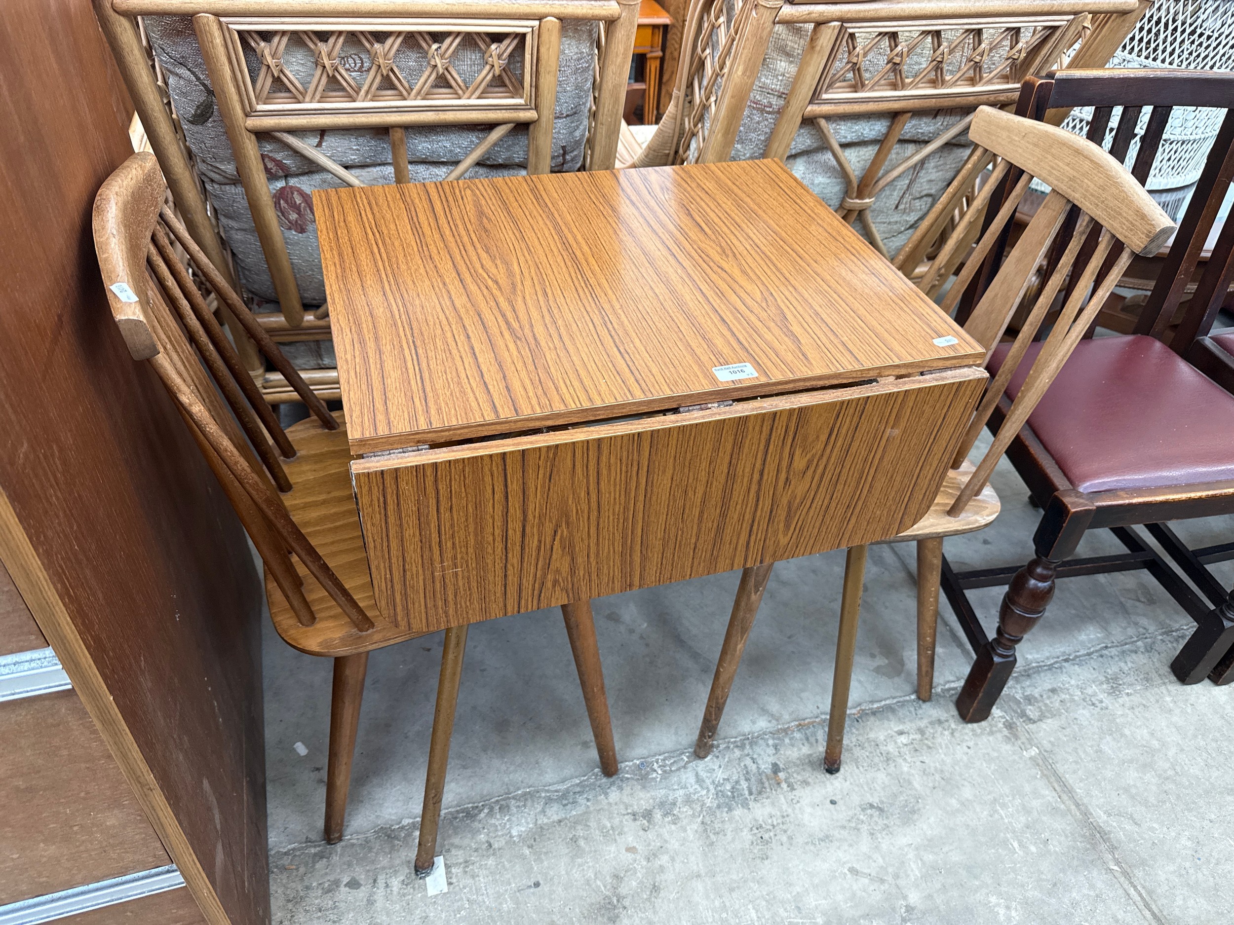 A small retro drop leaf breakfast table and 2 x spindle back chairs