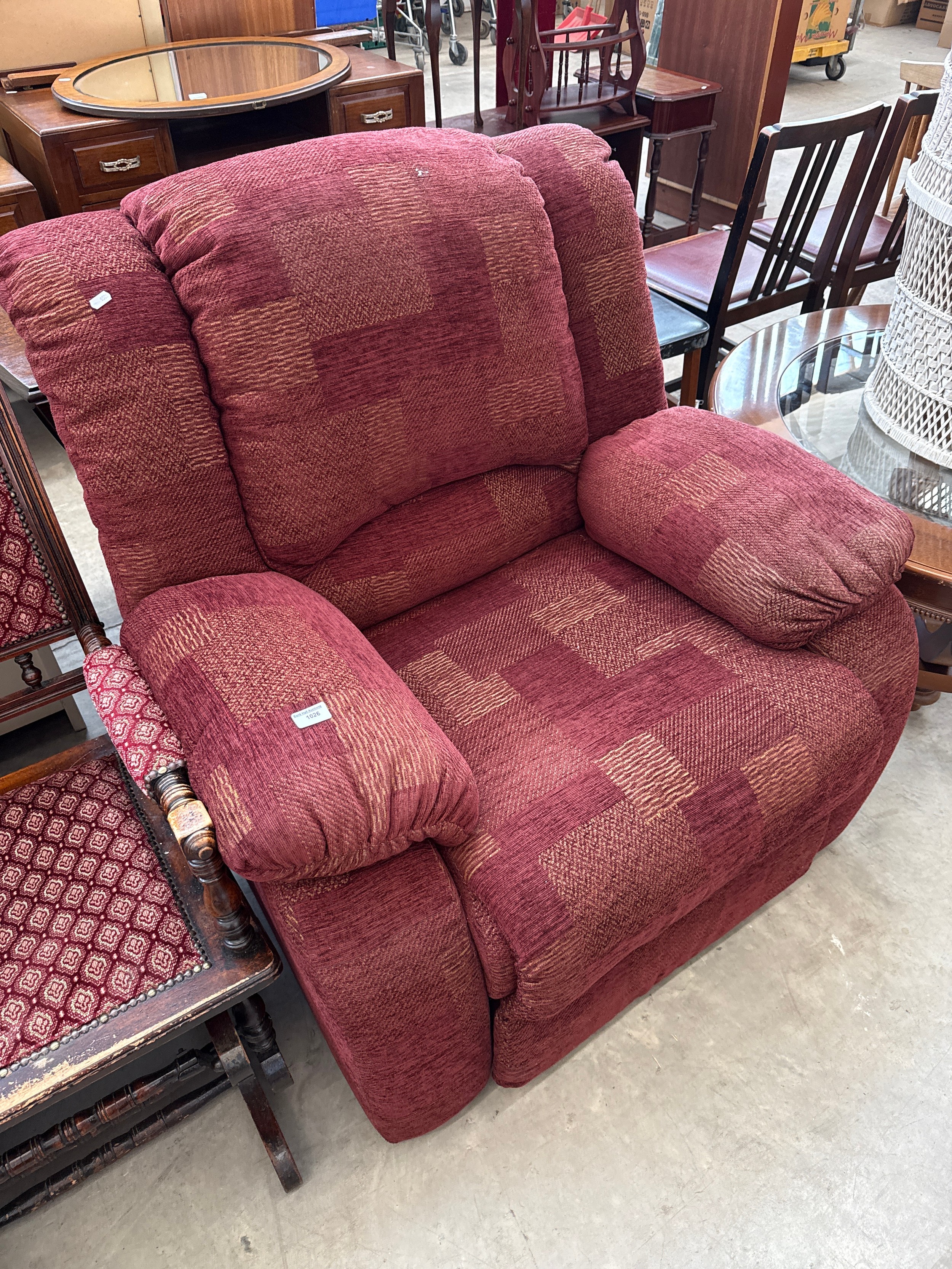 An upholstered recliner armchair