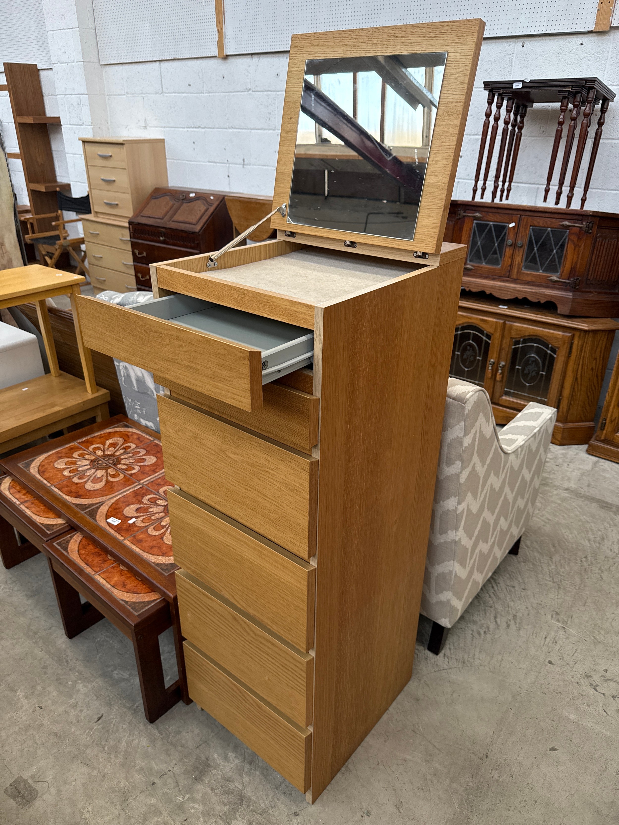 A tall modern 6 drawer bedroom chest
