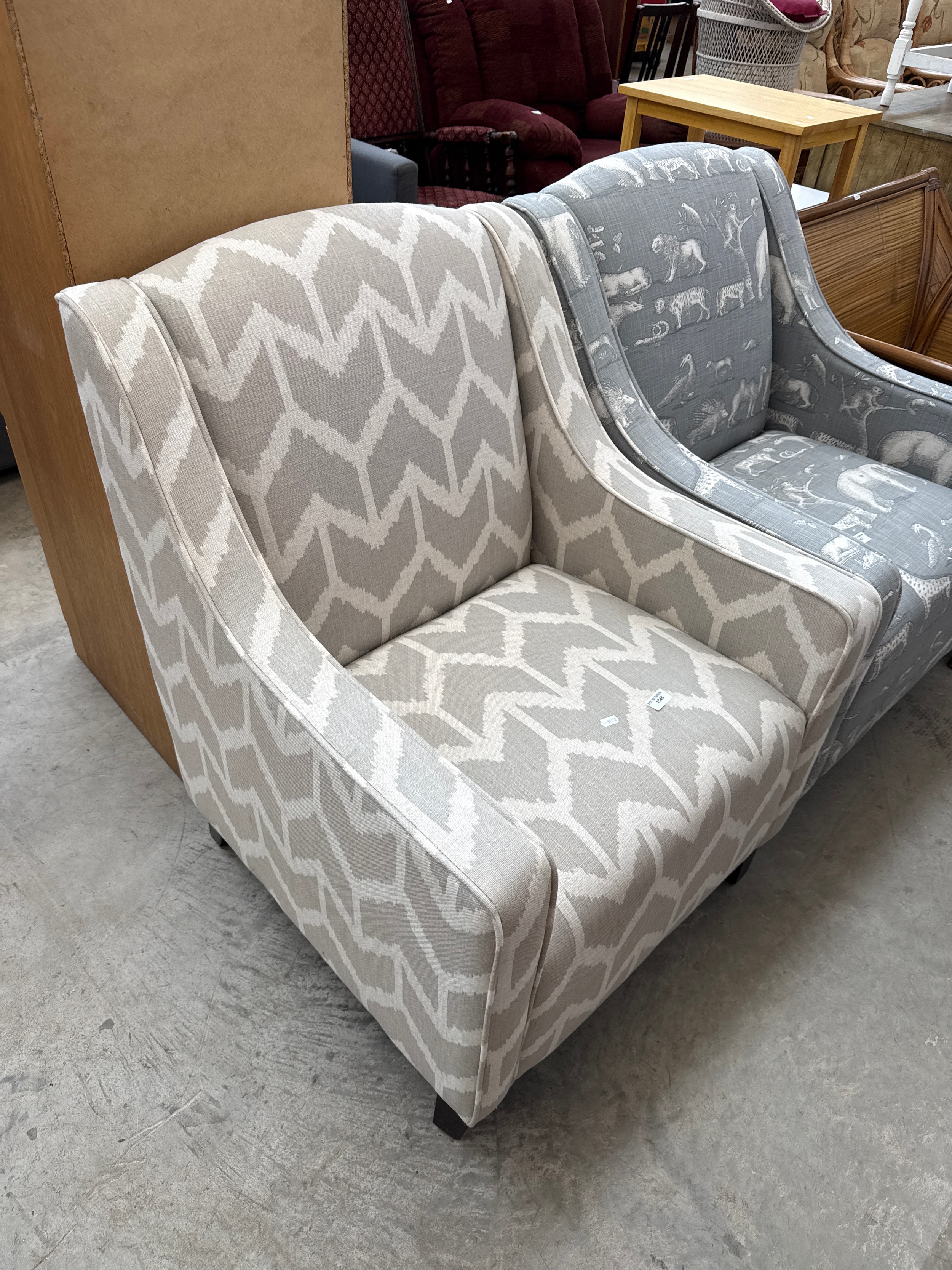 A small modern upholstered armchair
