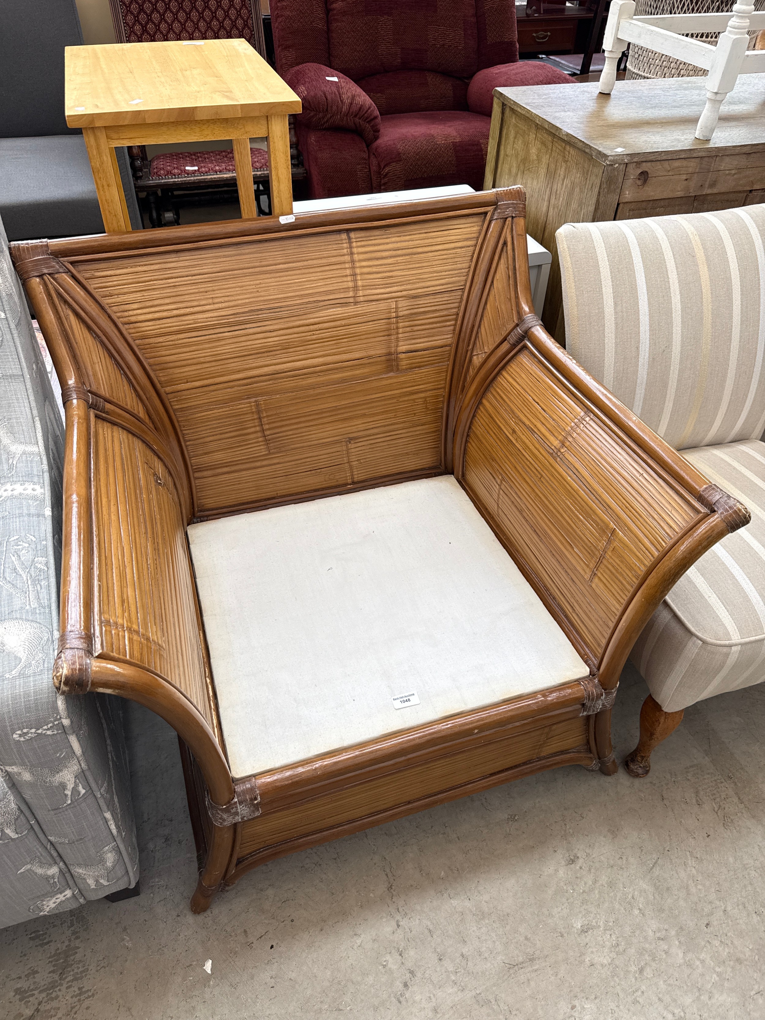 A wood framed conservatory armchair - no cushion