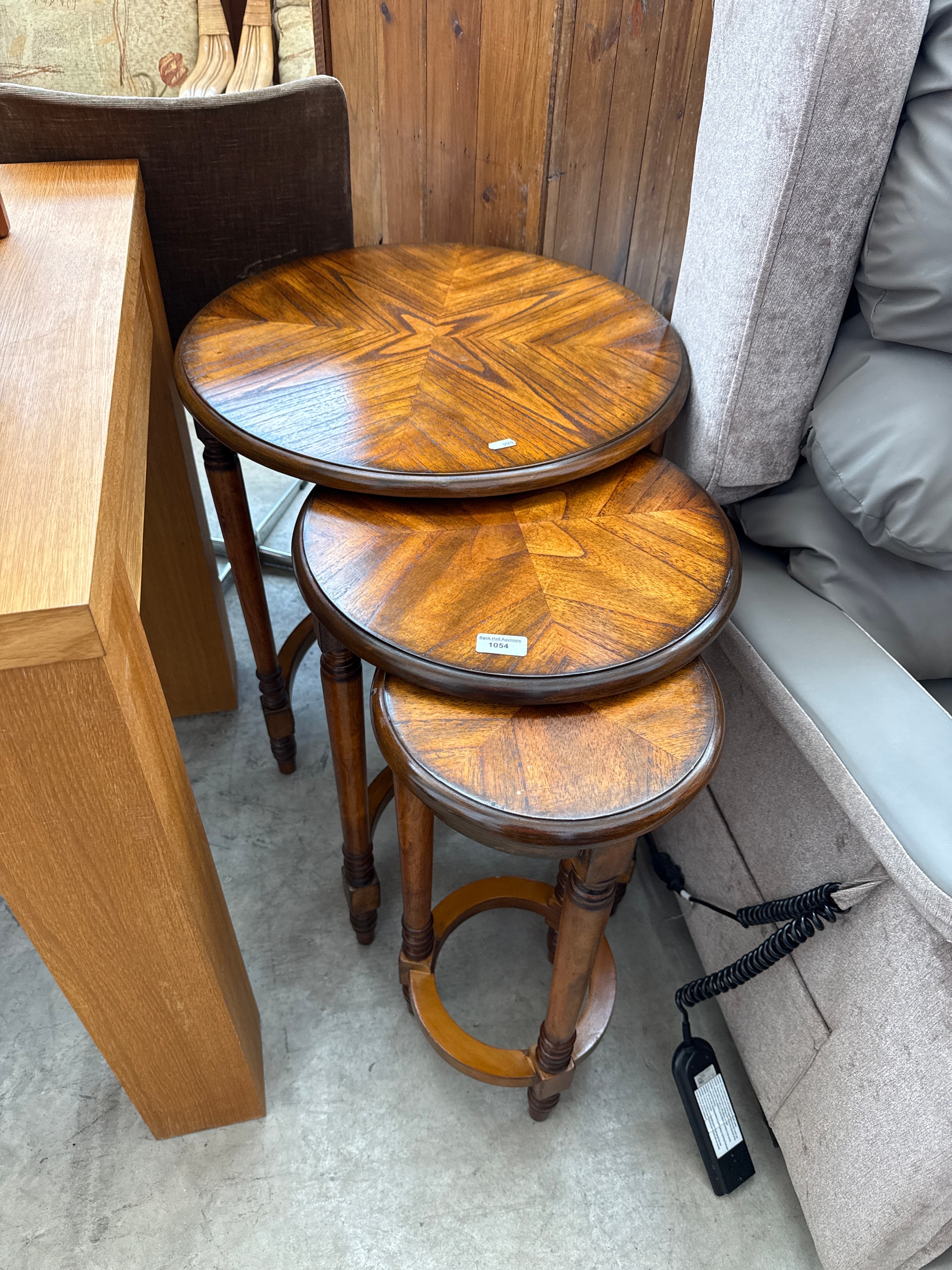 A nest of 3 x tall nested occasional tables