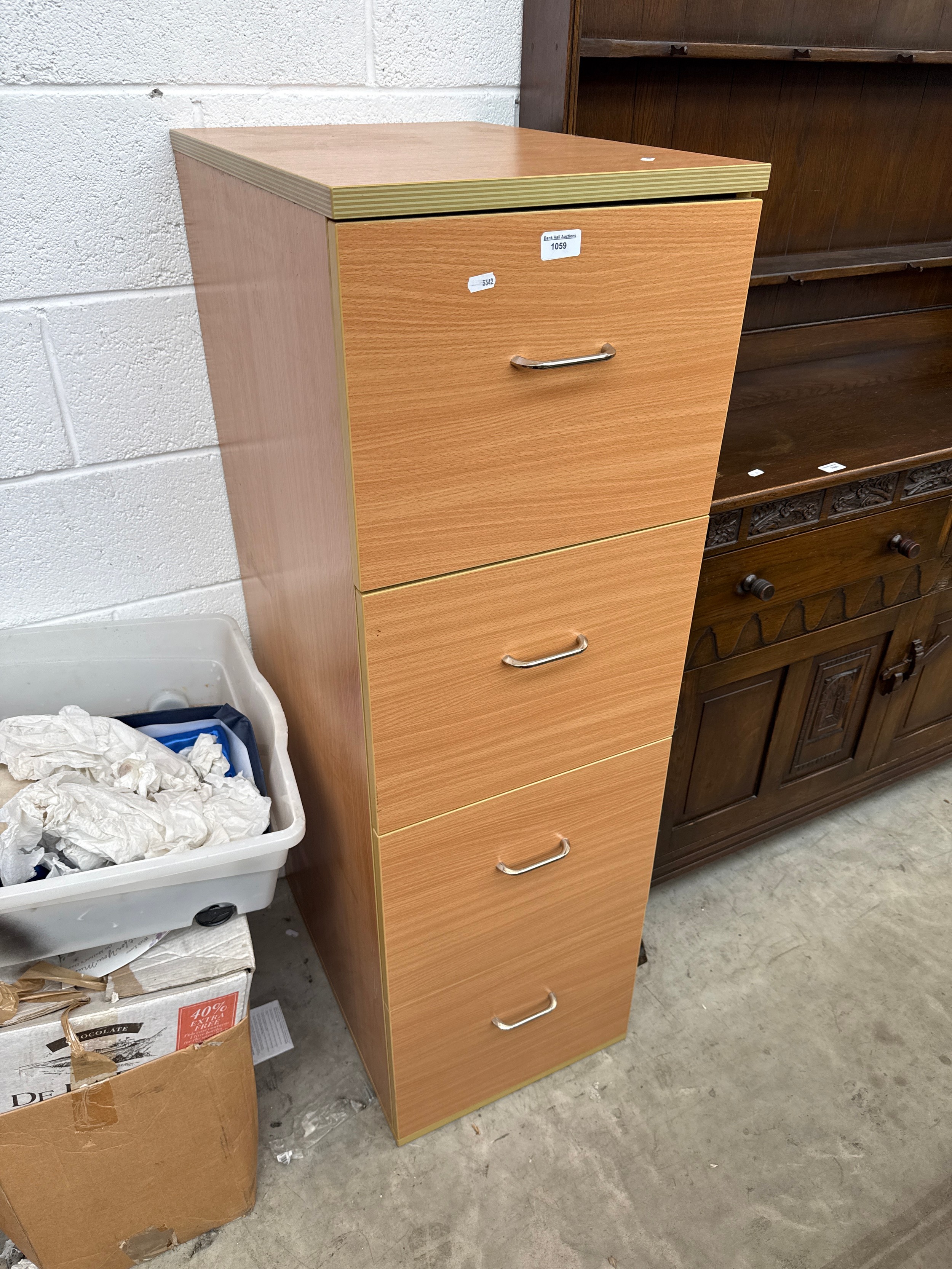 A modern 4 drawer wooden filing cabinet