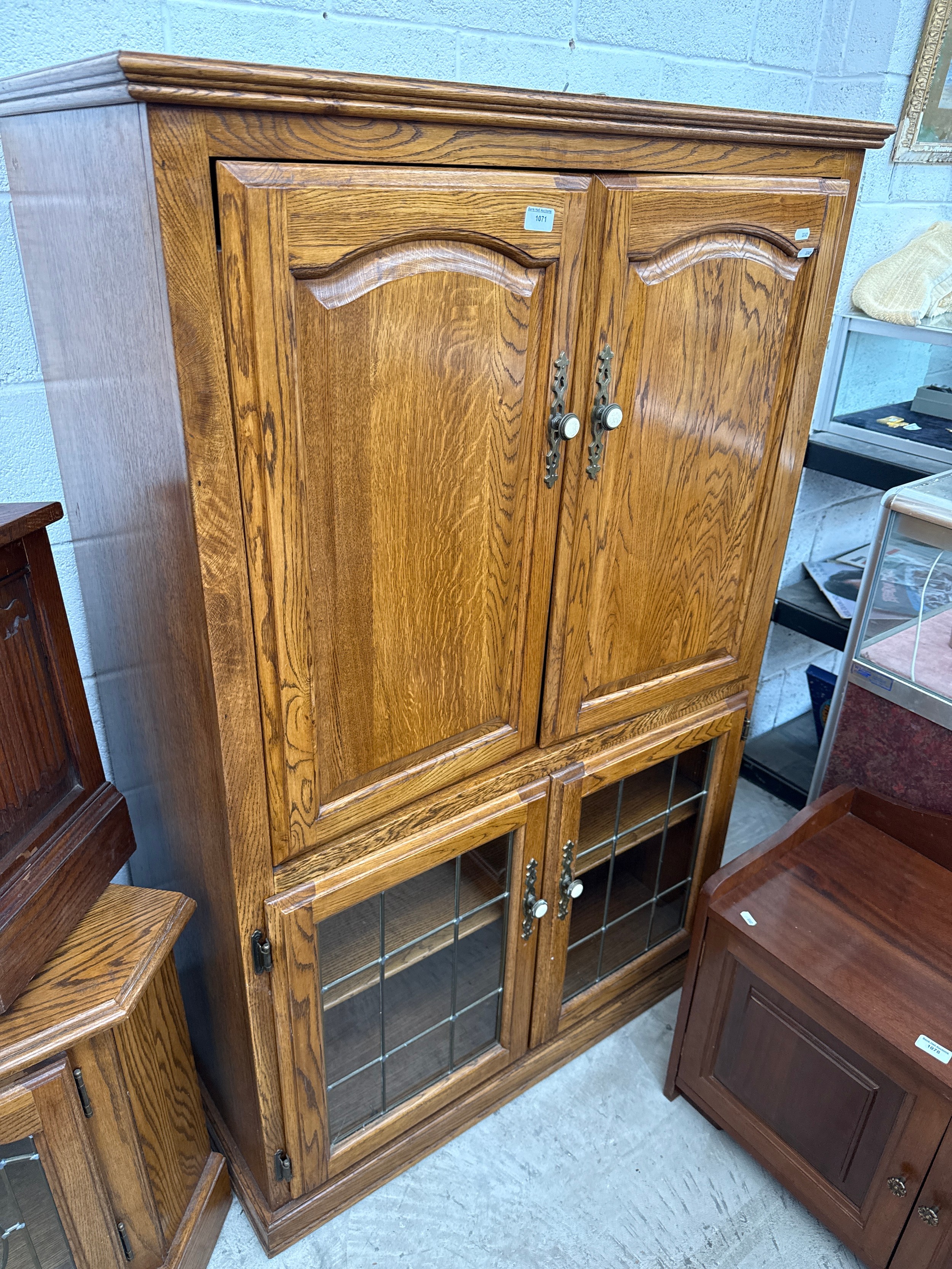 A large vintage glazed oak 4 door cocktail cabinet