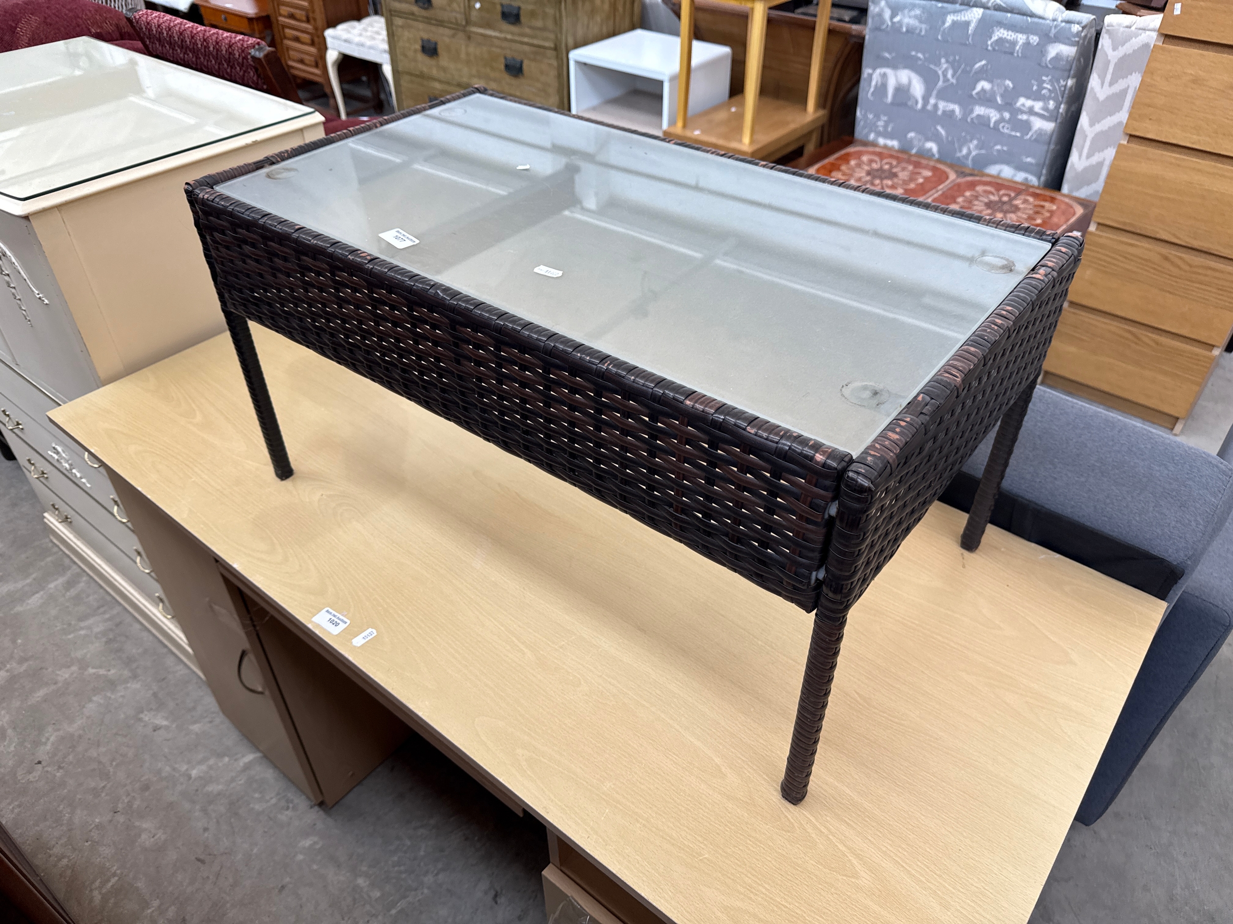 Small woven smoked glass table