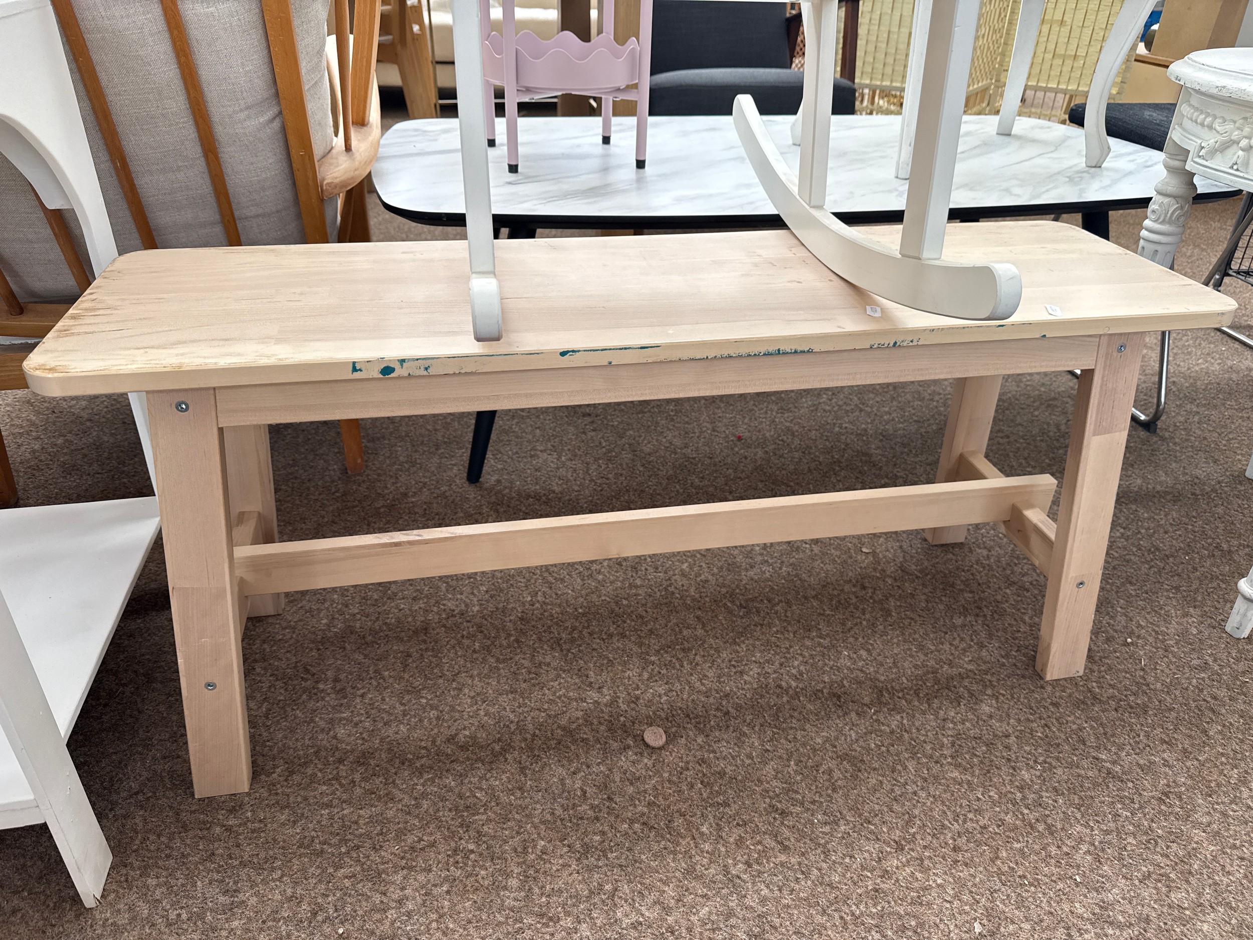 A 1 metre wide wooden bench