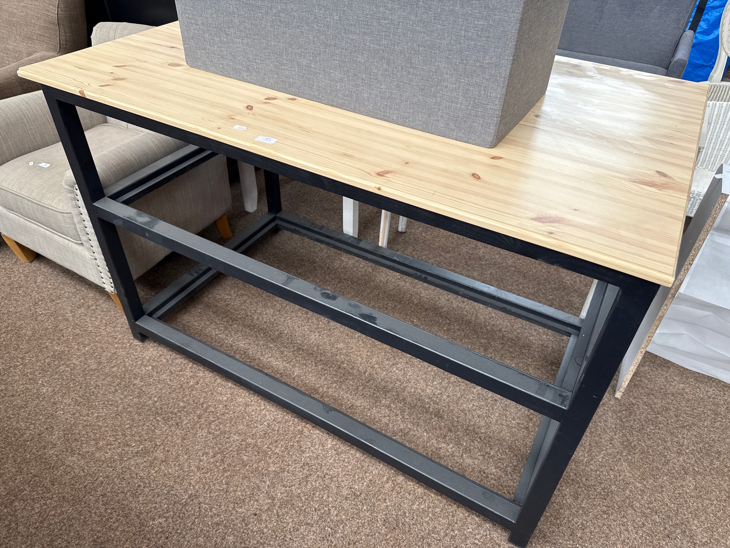 A large stripped wood work table on painted wooden frame, as new, never used