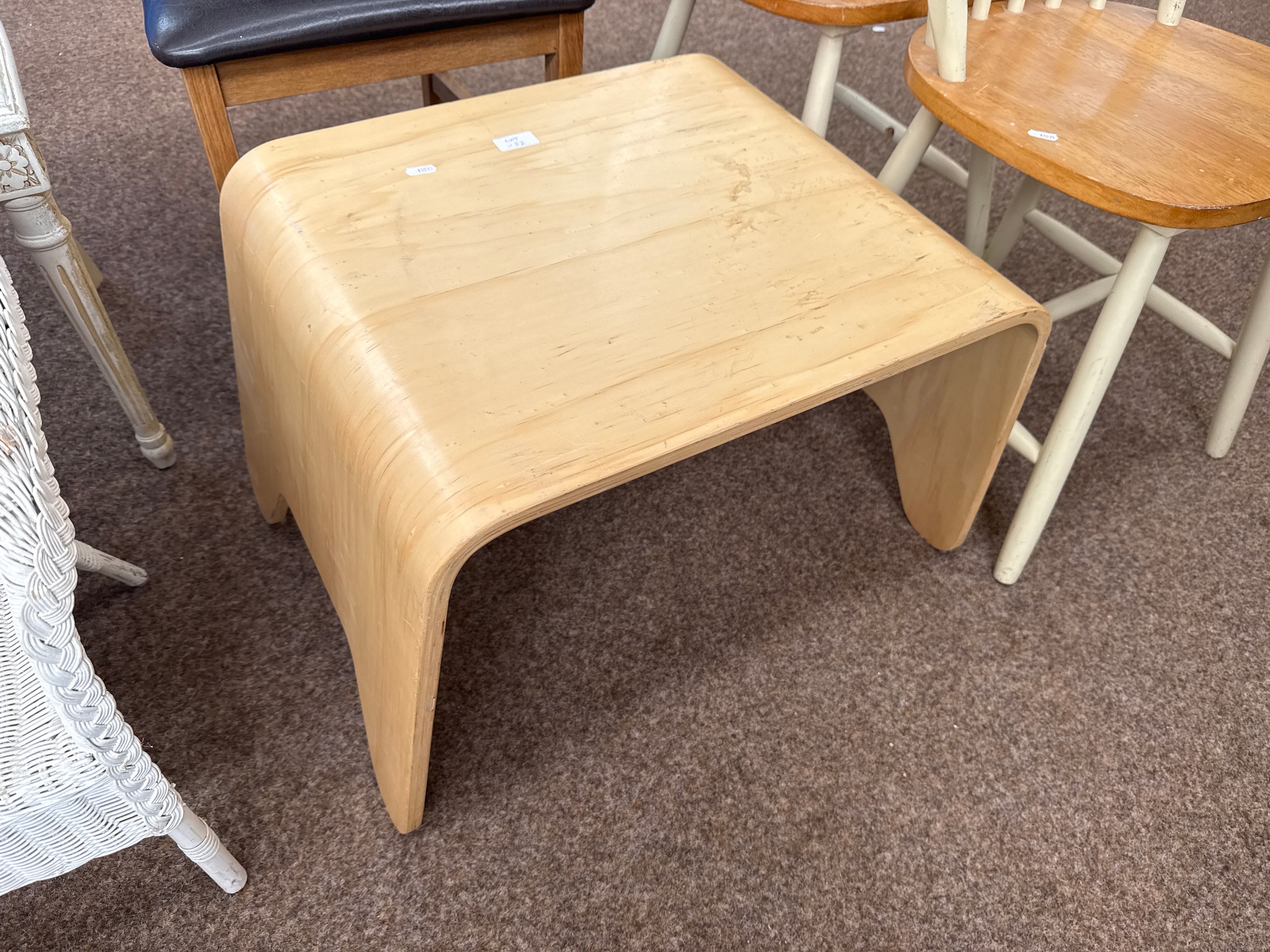 A modern wooden board occasional table