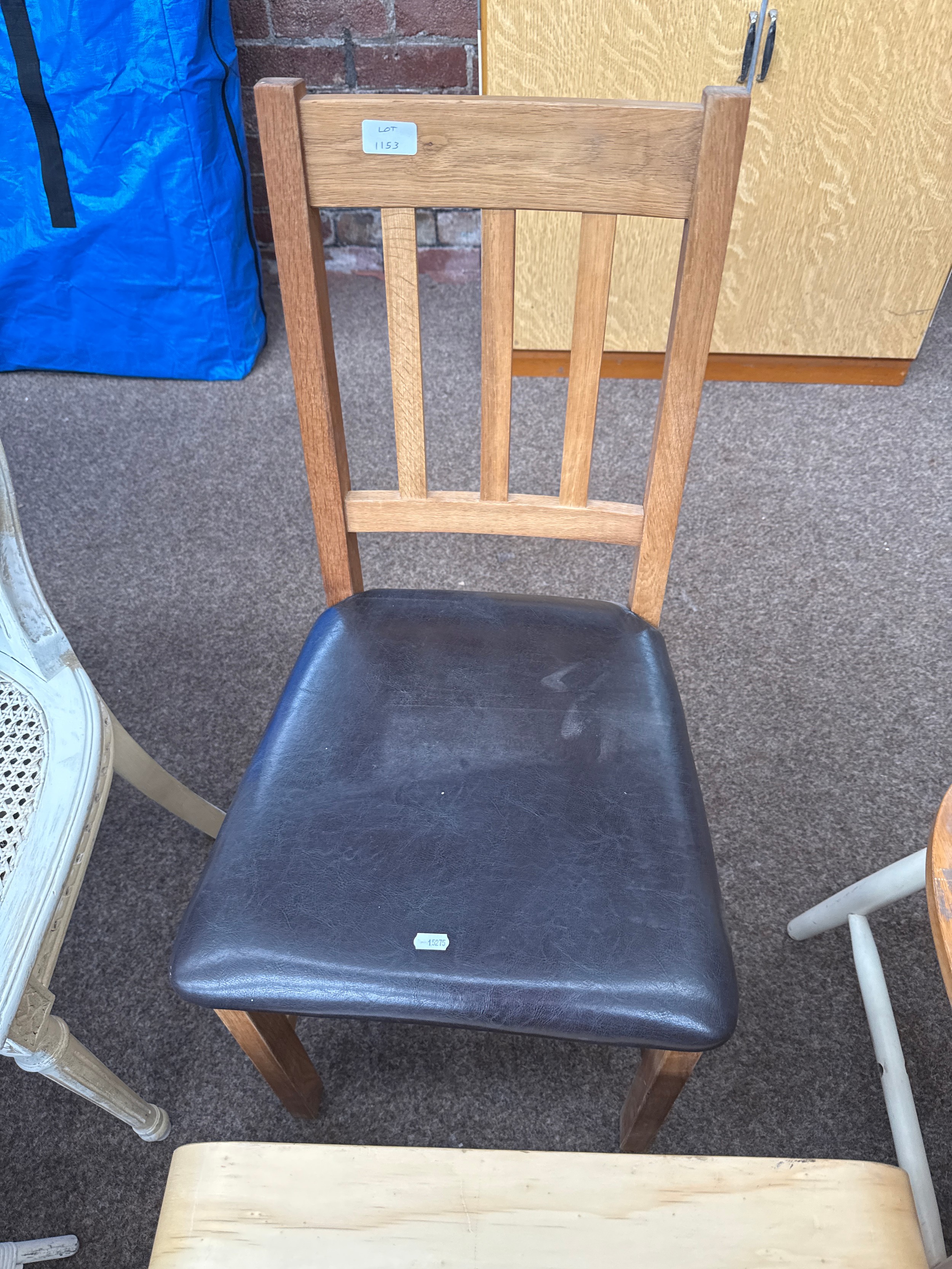 A retro light oak dining chair with padded seat, as new, never used