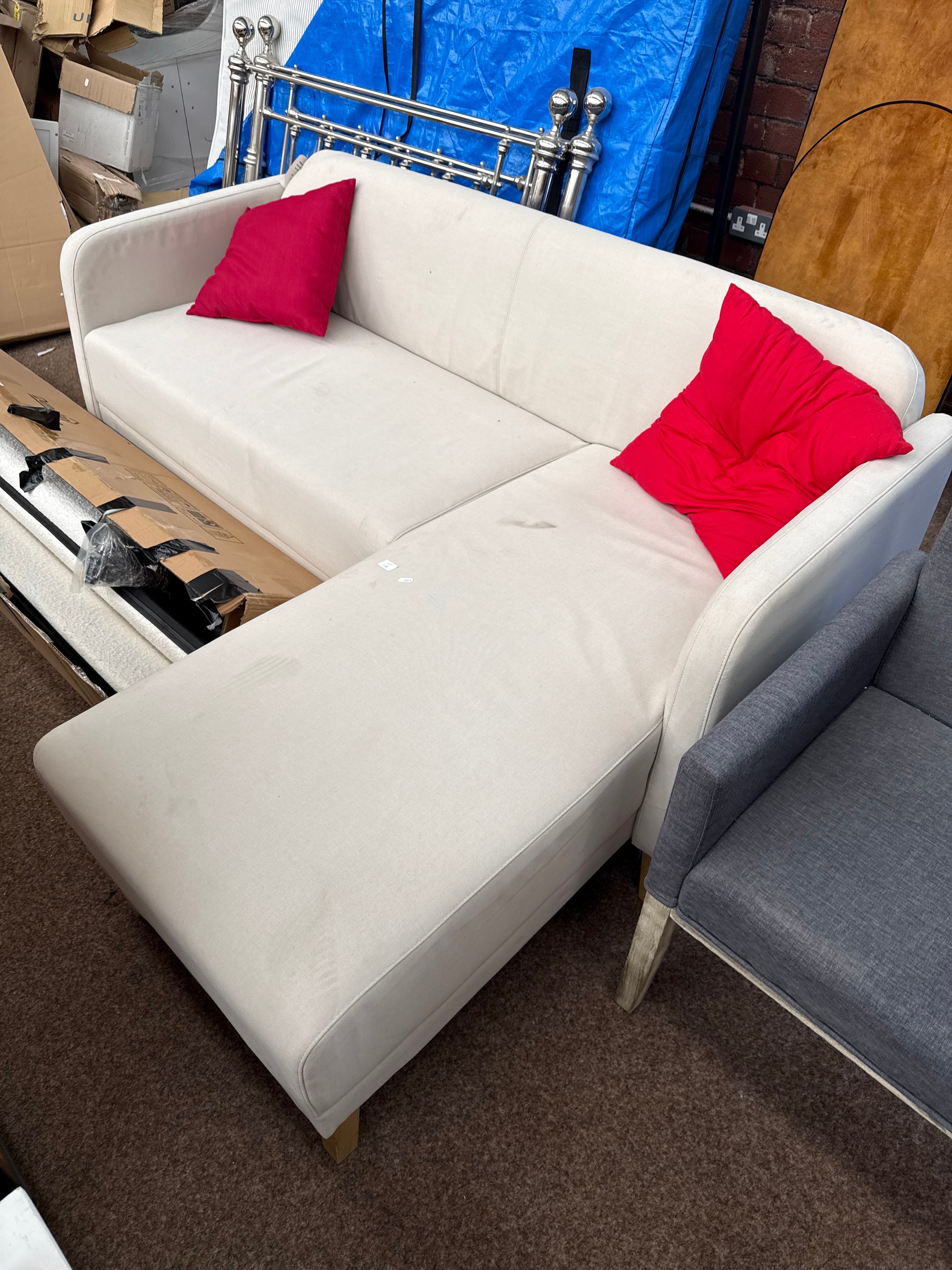 An upholstered corner settee, as new, never used