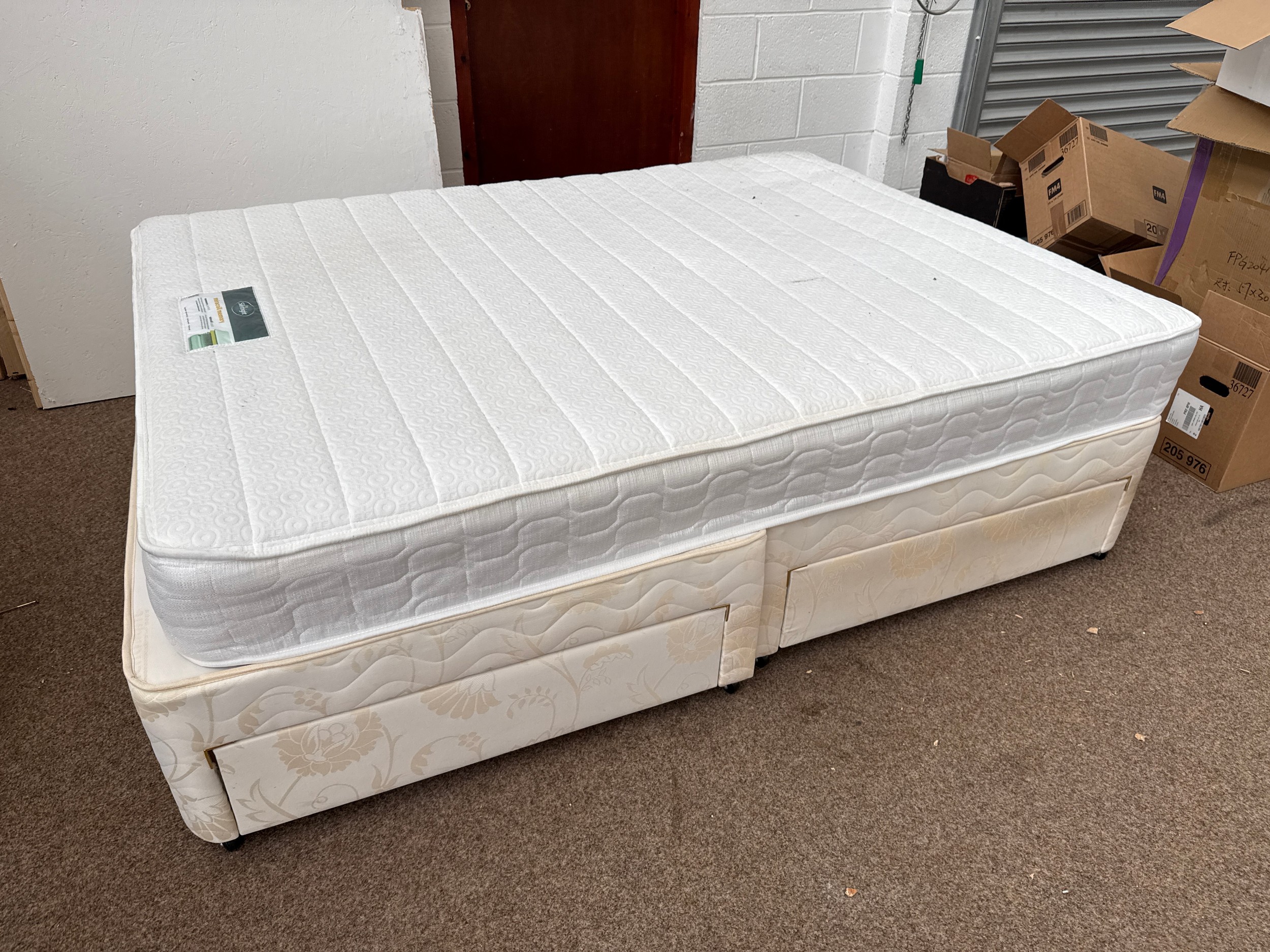 A King Size divan bed with Silentnight mattress