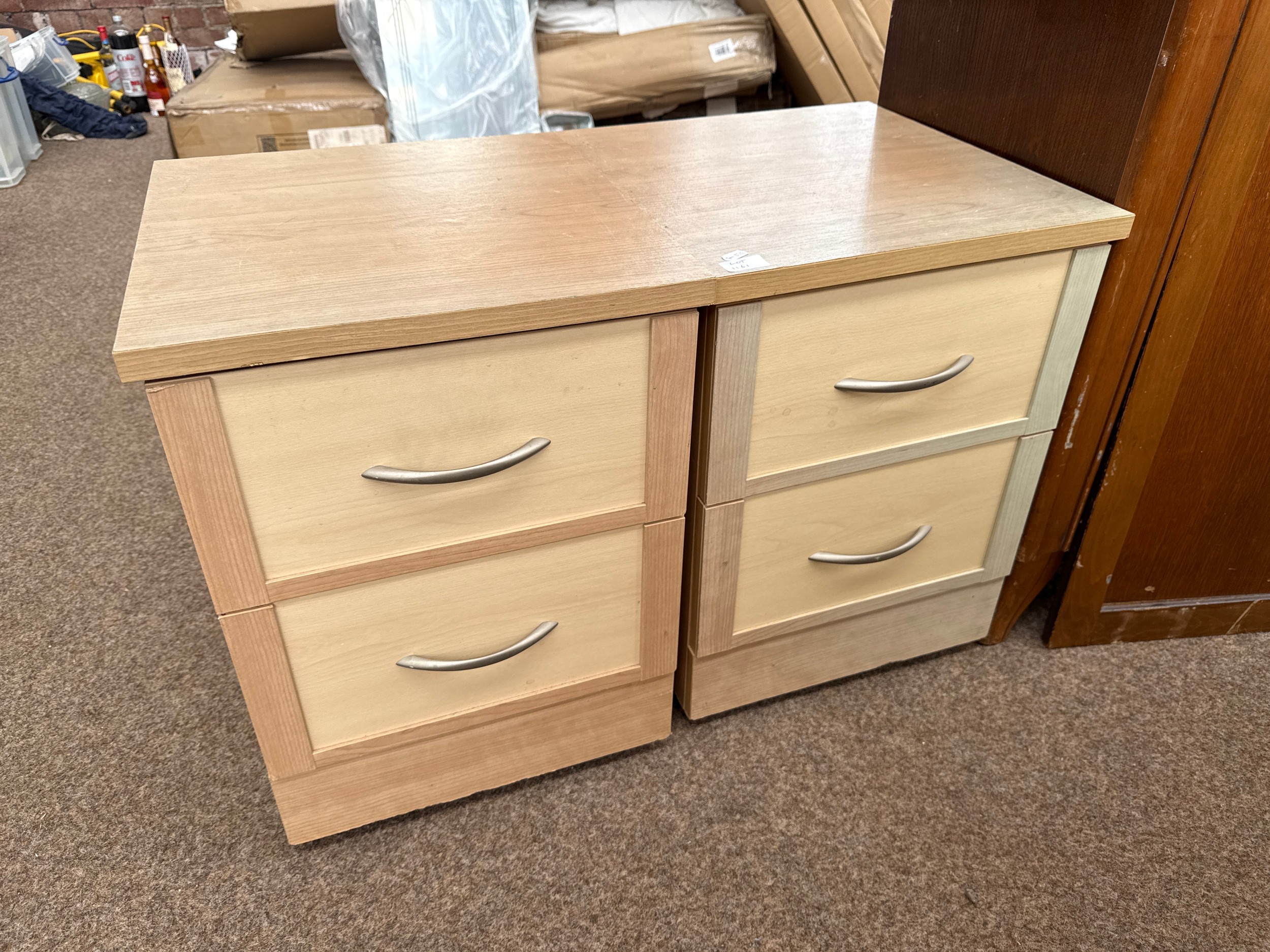A pair of 2 drawer bedside chests