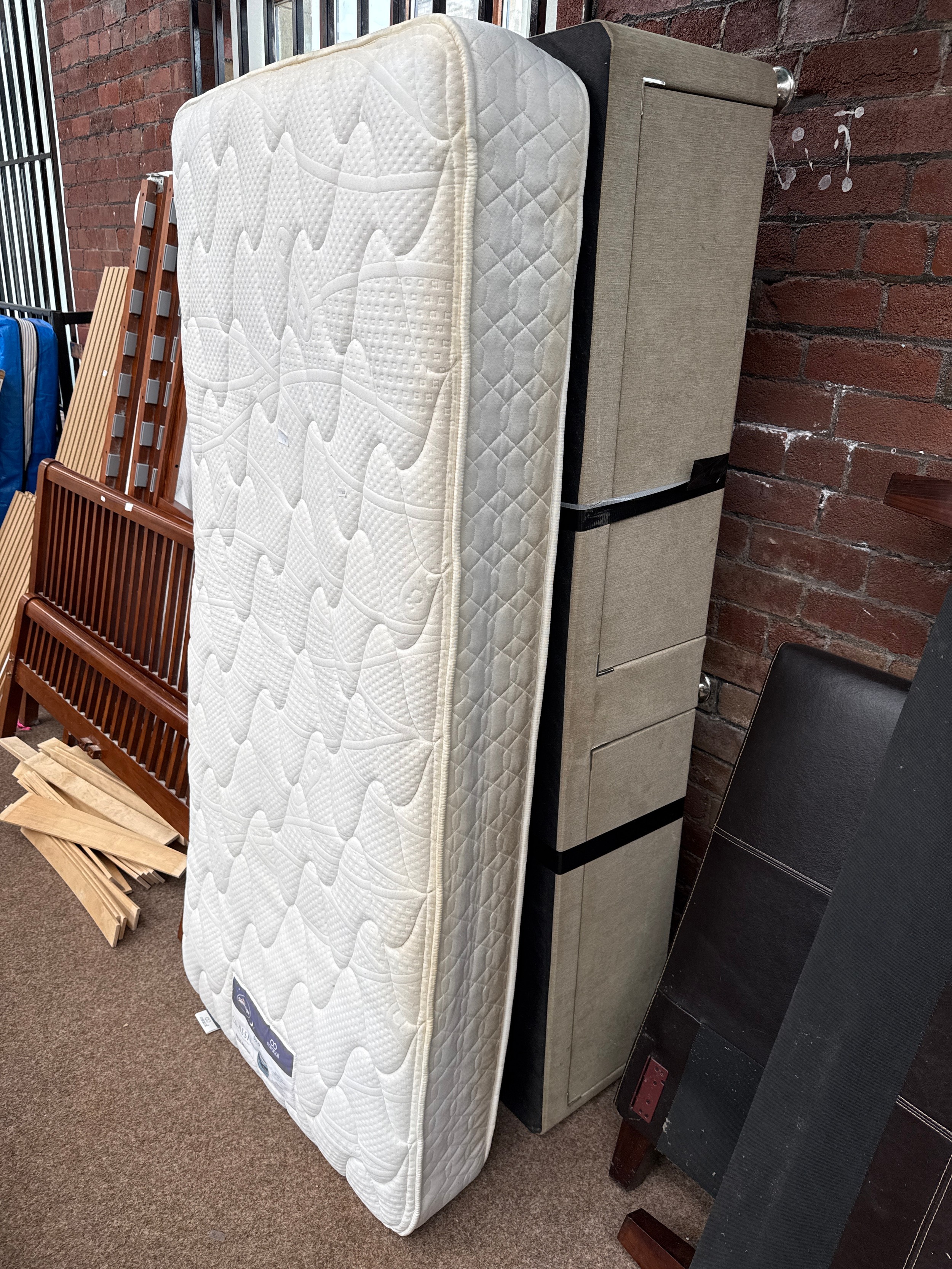 A single divan bed with mattress