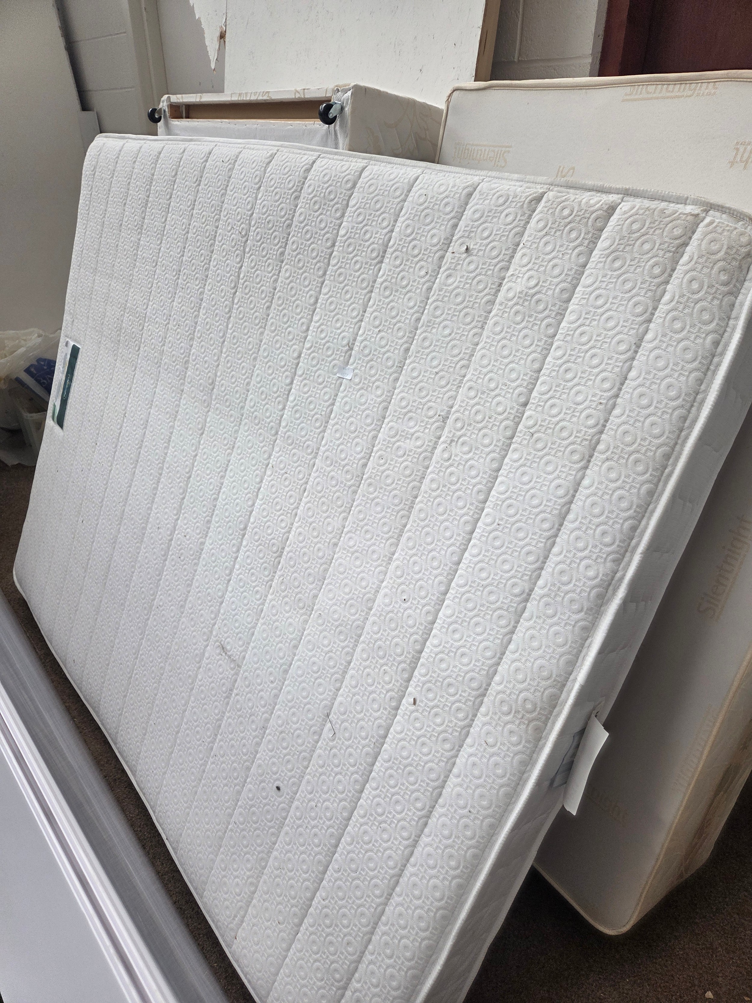 A double divan bed with mattress