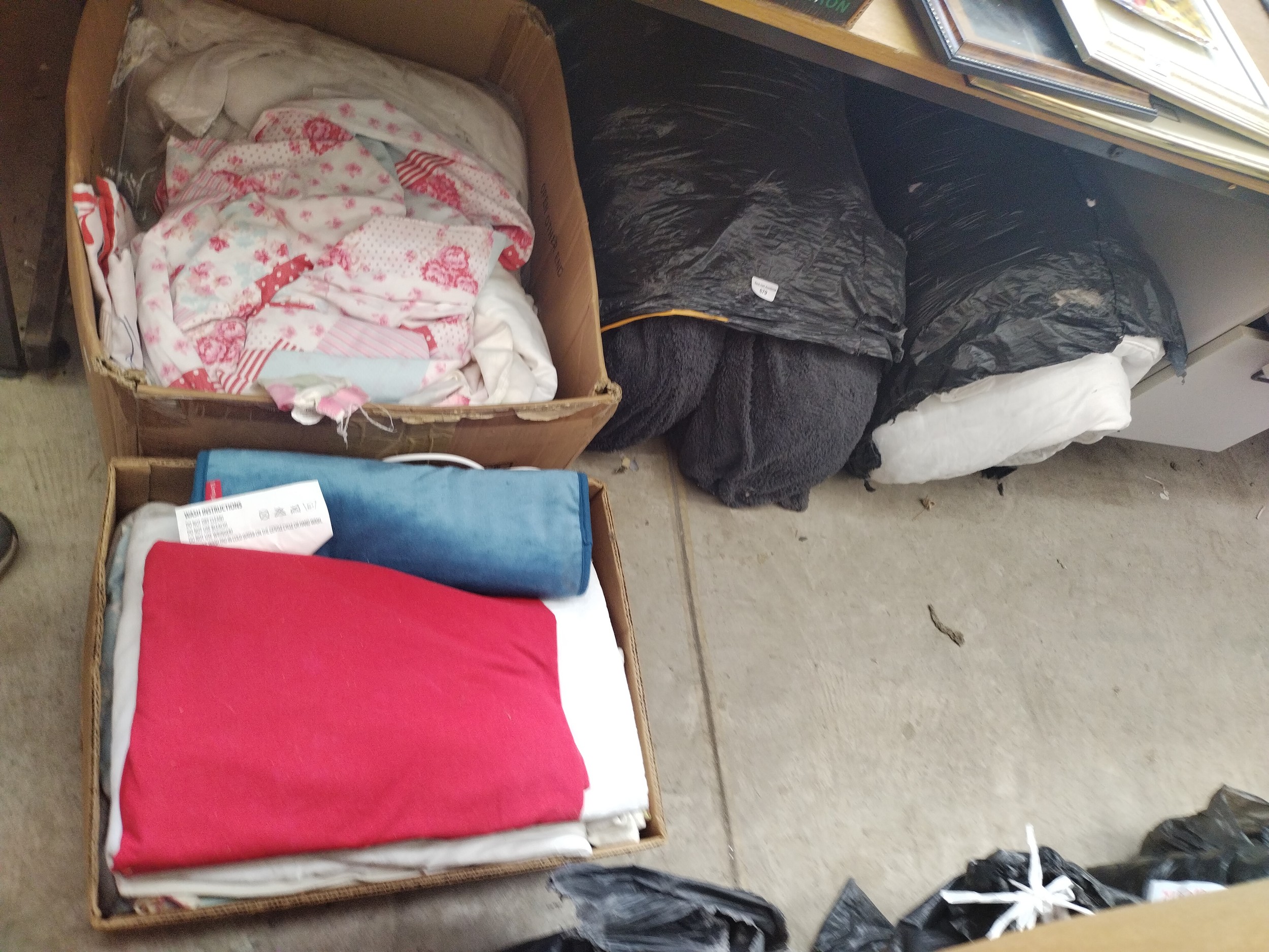 Two boxes and bag of home furnishings