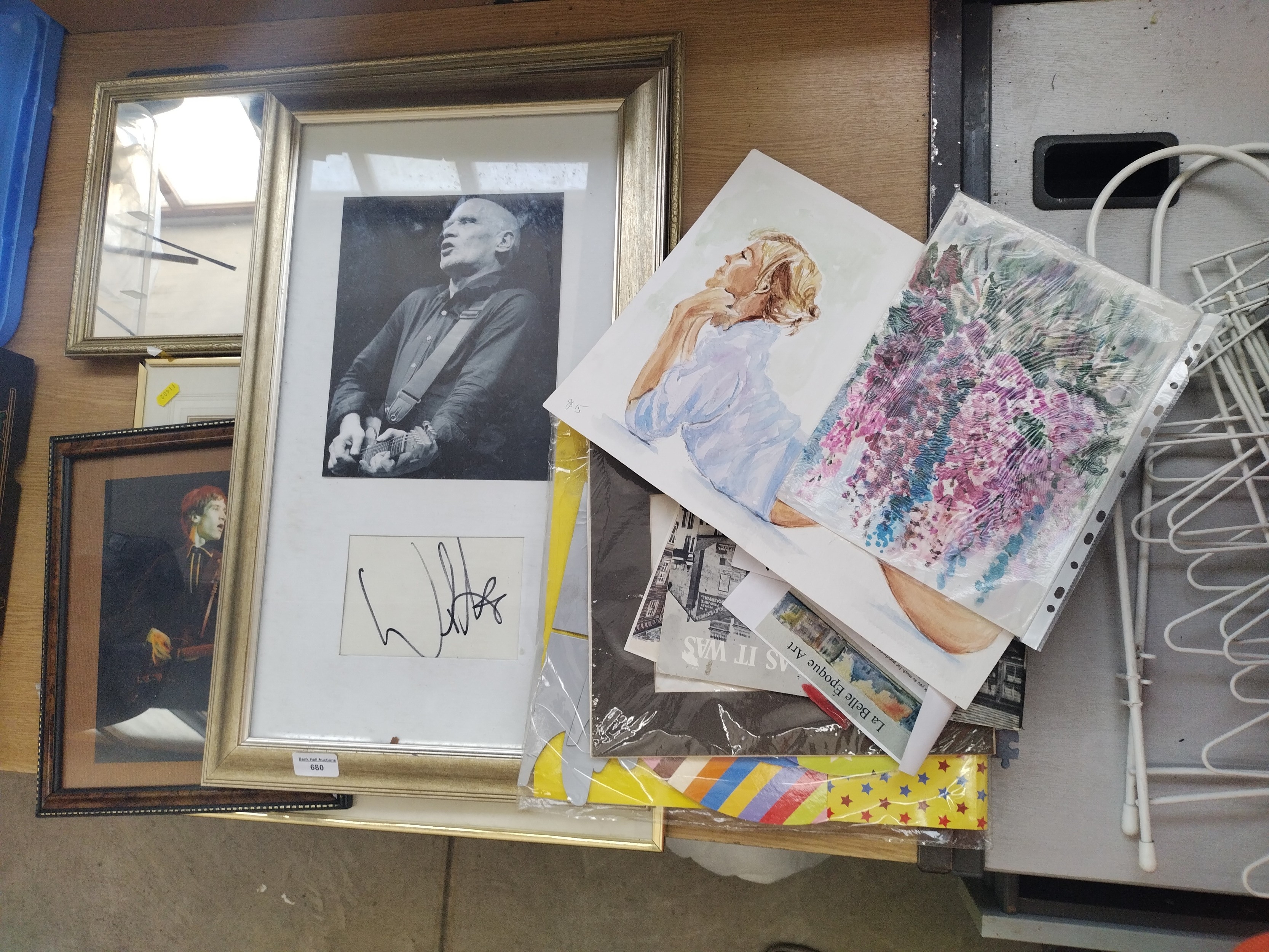 Small collection of artwork and cardboard cake stand