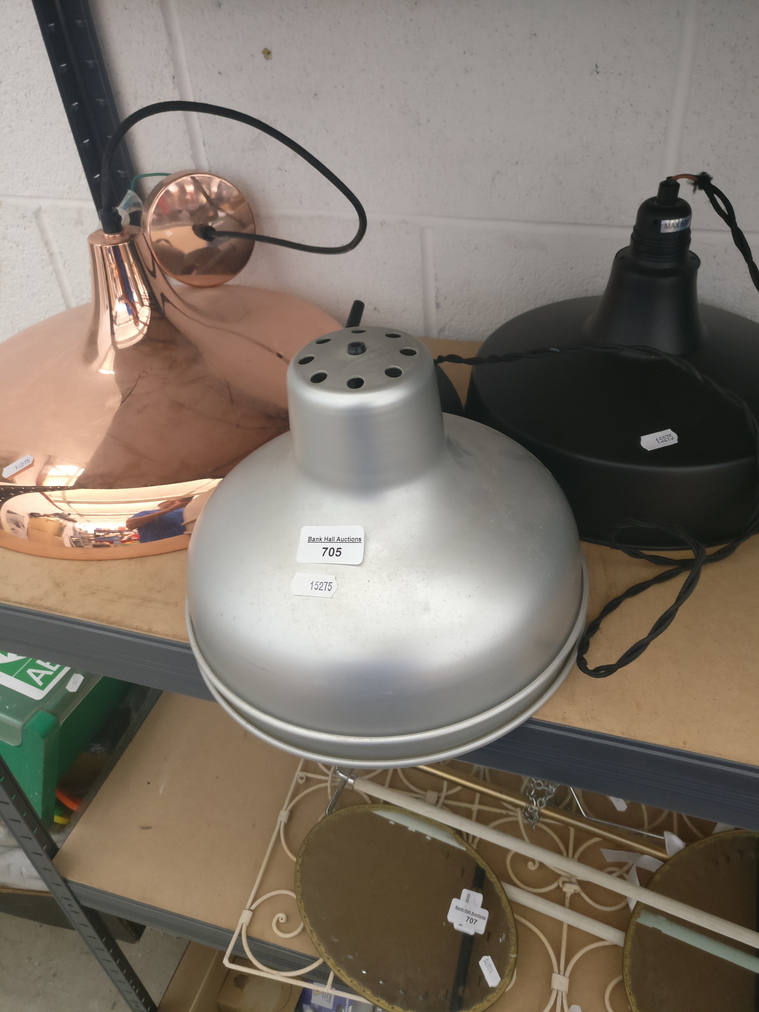 Three enamel light fittings