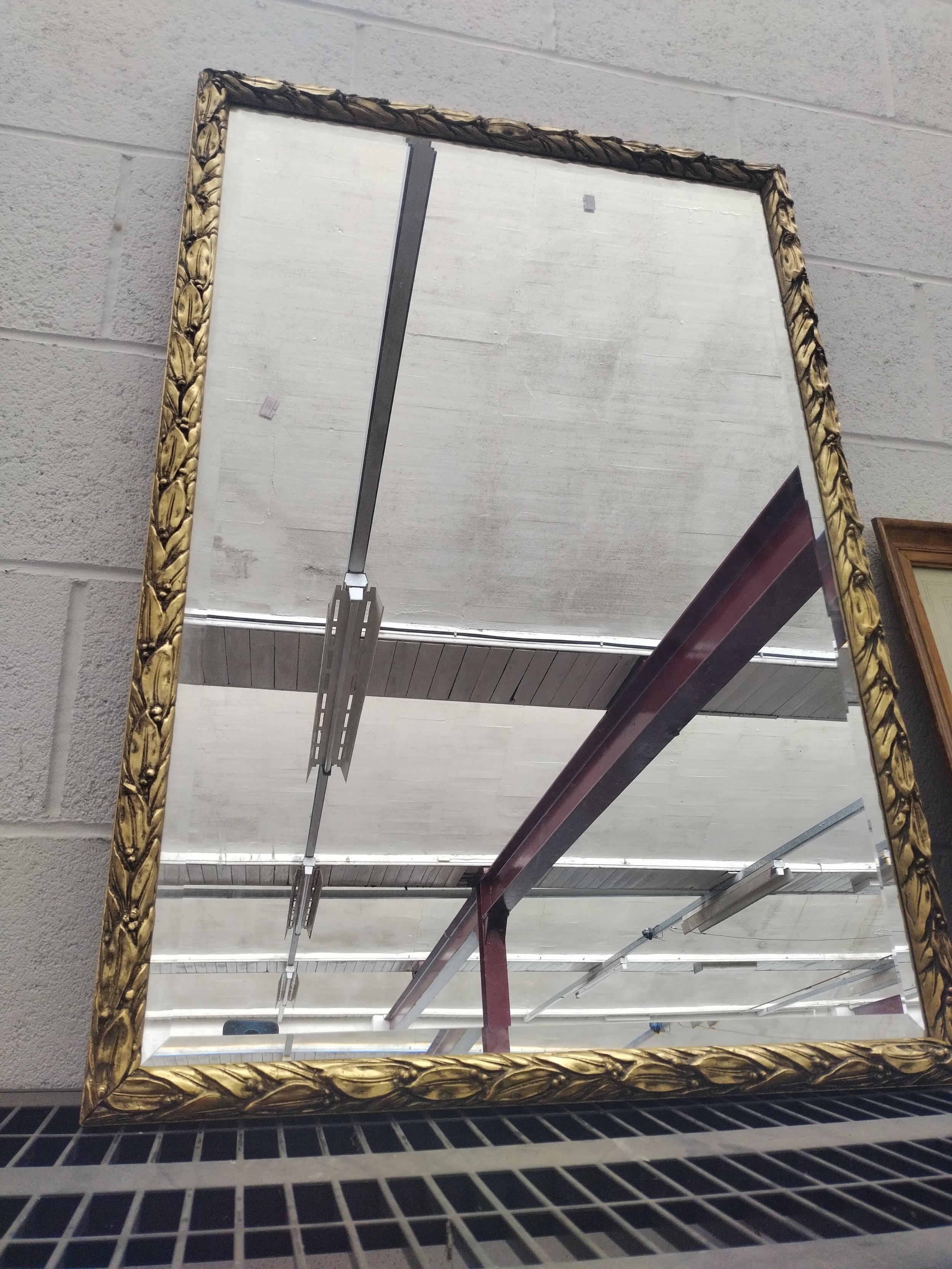 Large ornate gilt framed mirror