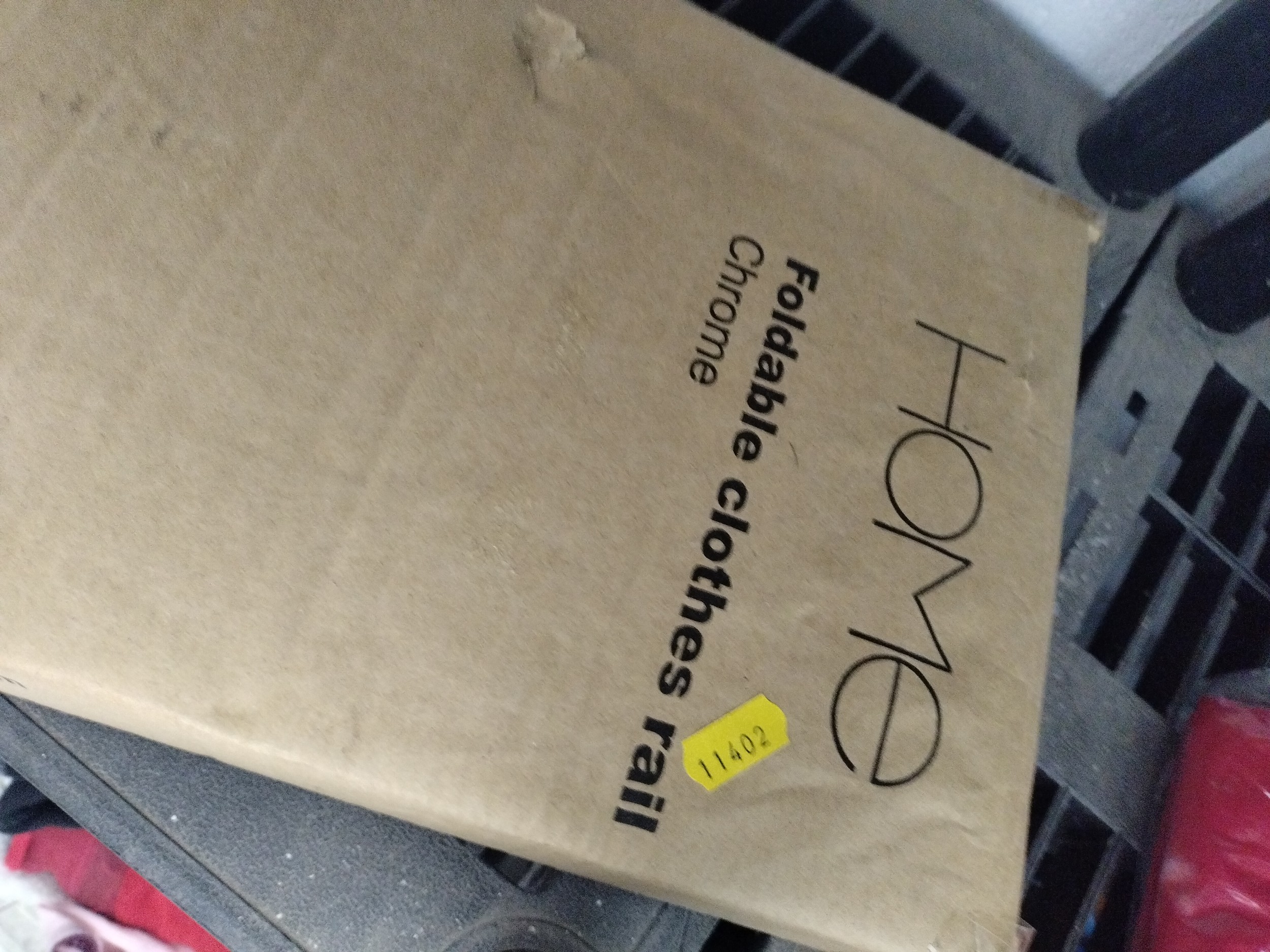 Boxed foldable clothes rail