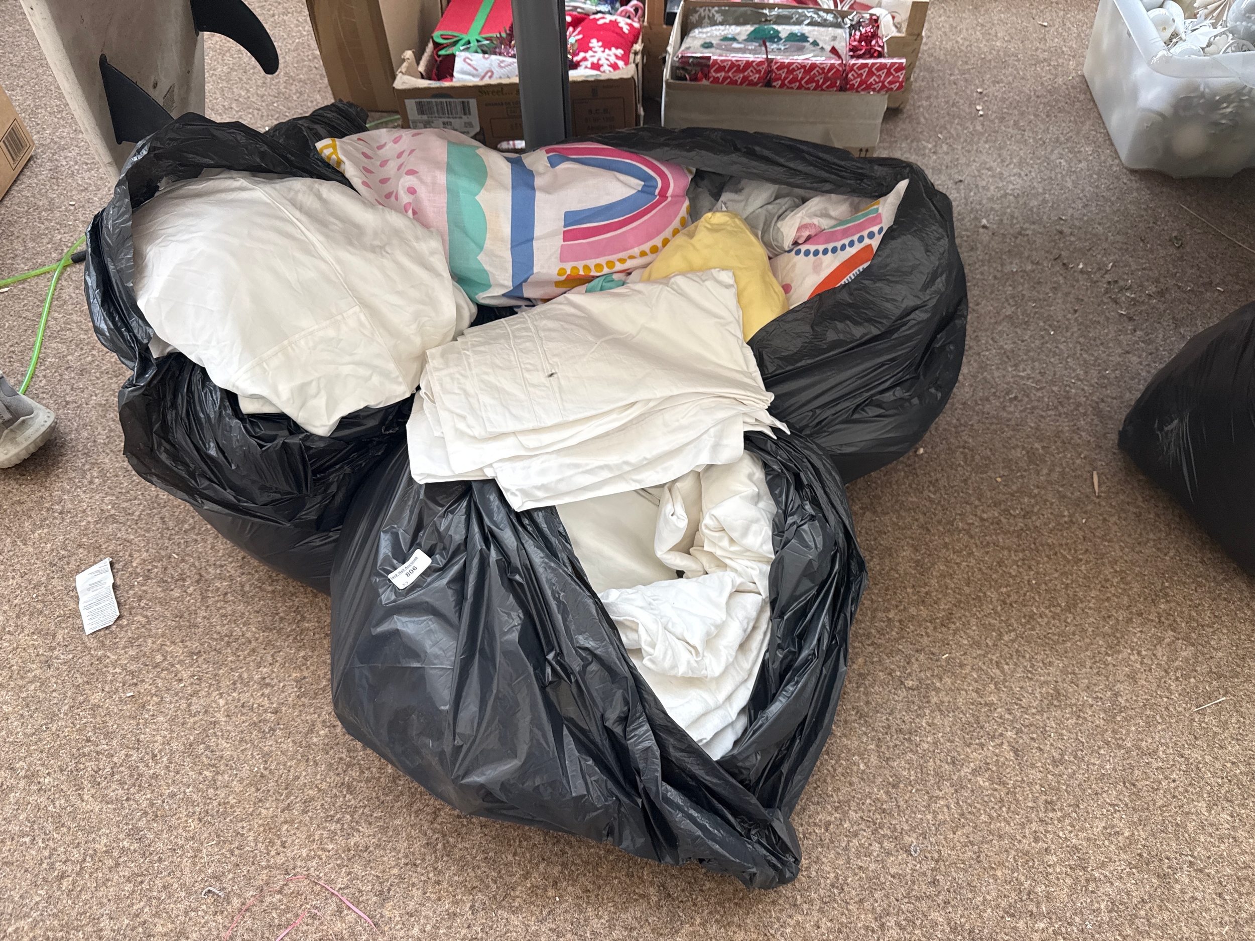 Three bags of bed sheets