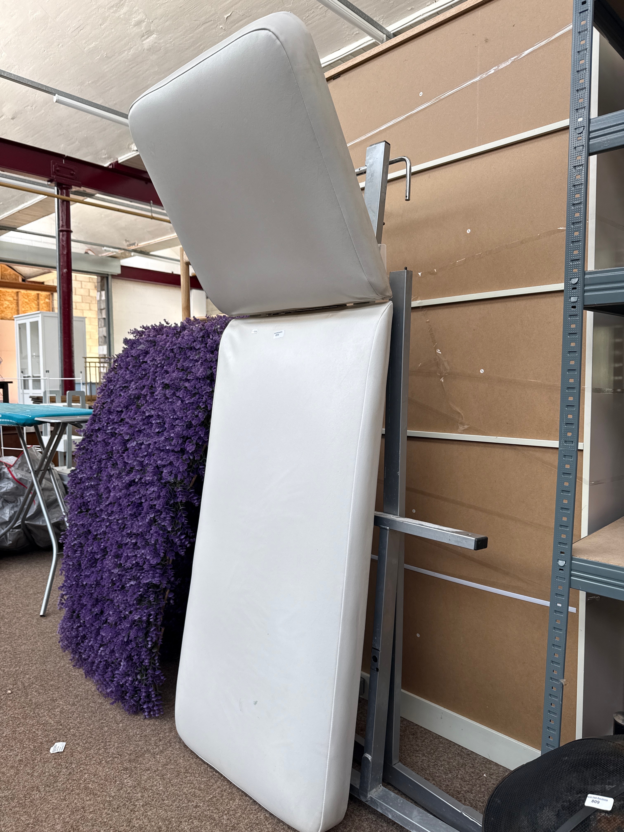 Large white massage bed