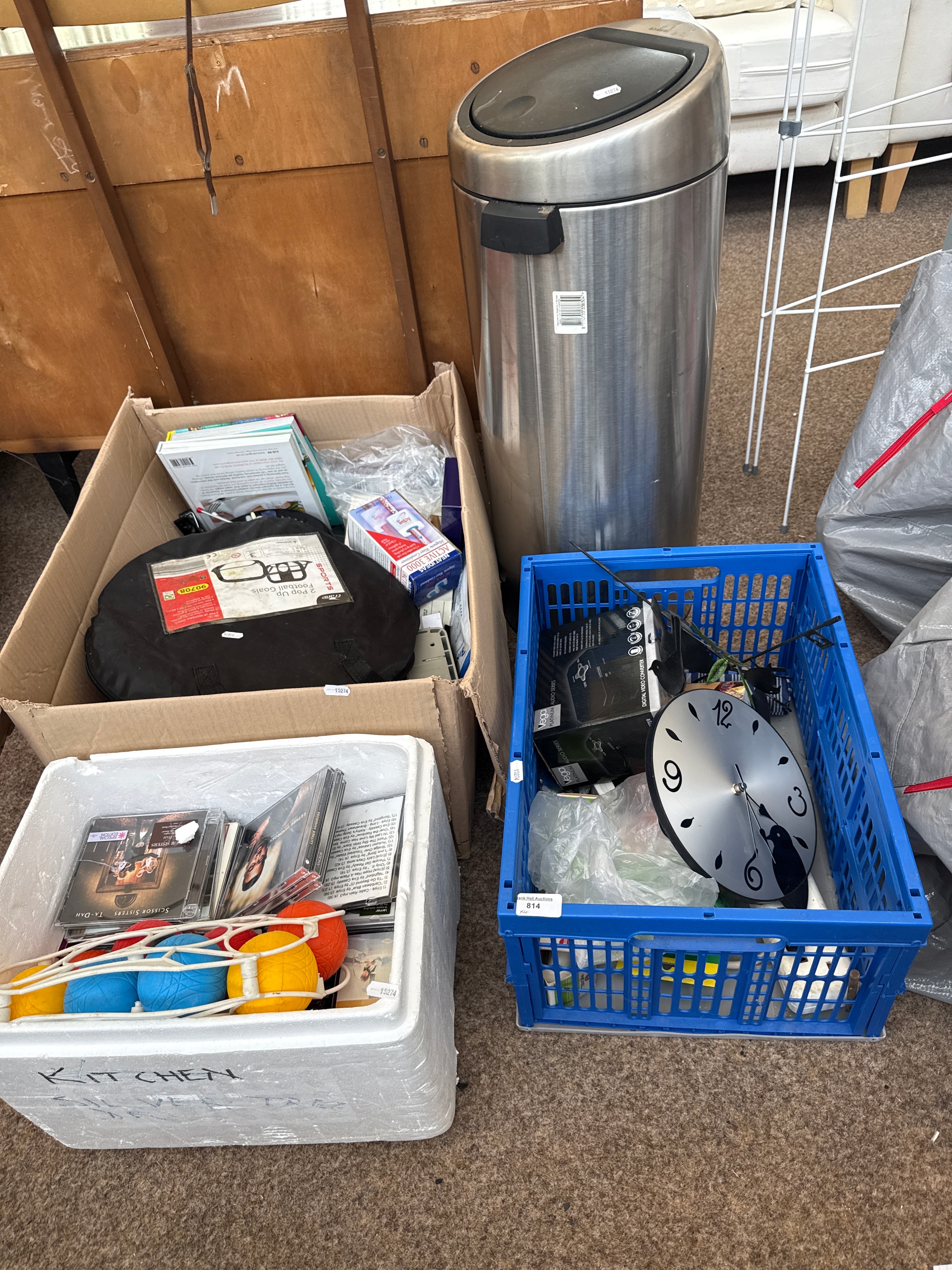 Three boxes of mixed household items and a bin