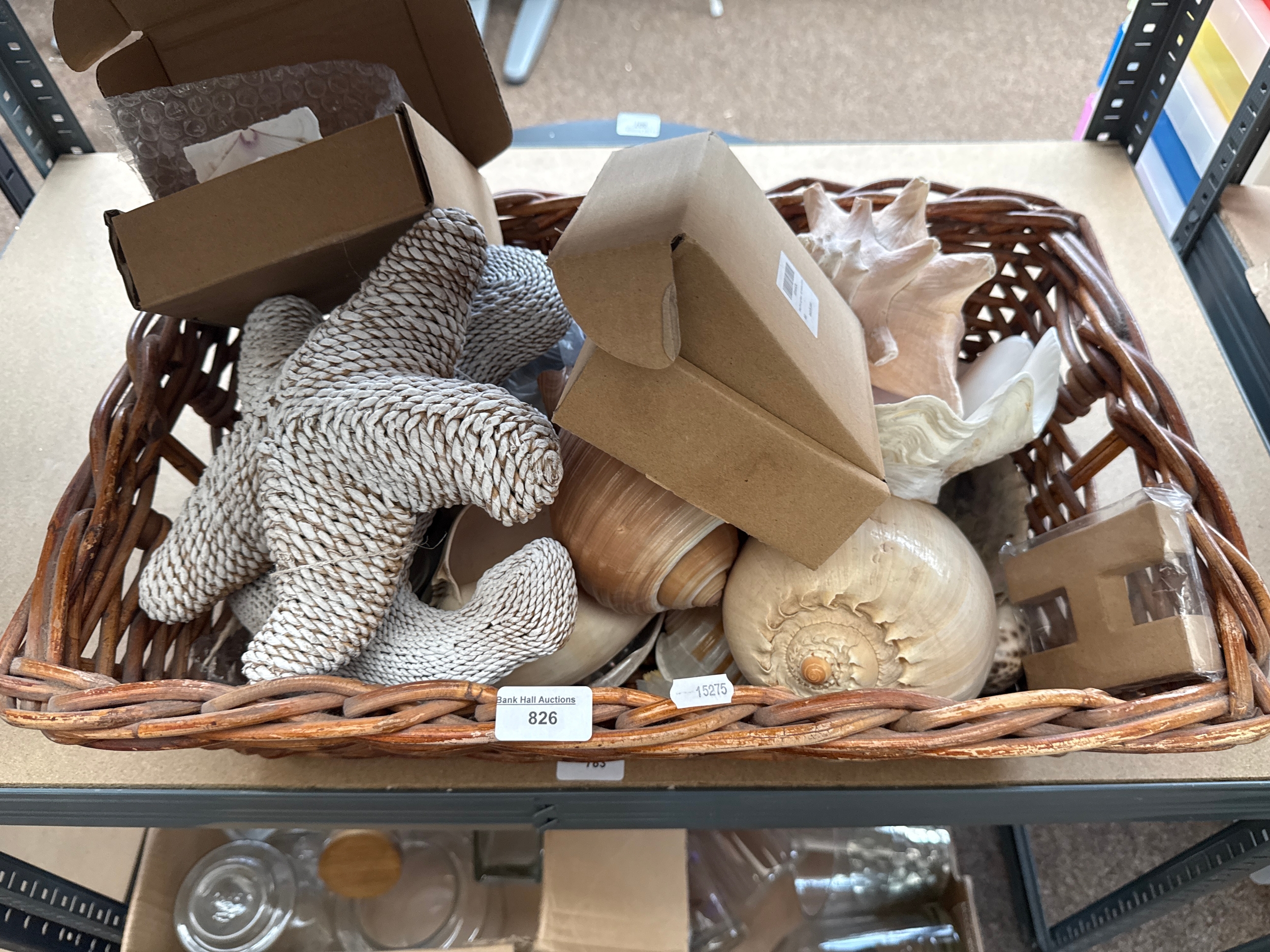 Basket of shells and sea side related items