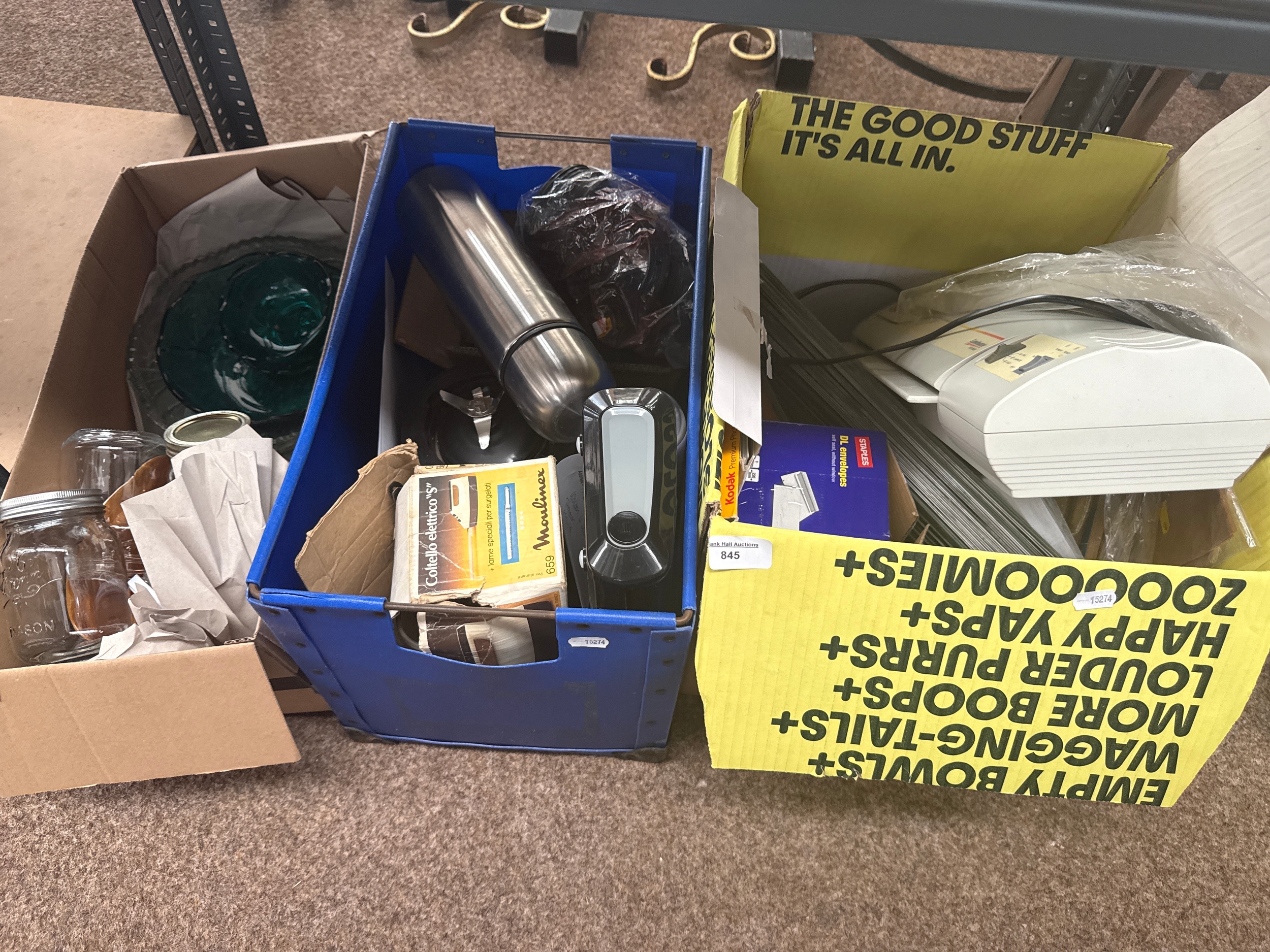 Three boxes of mixed household items