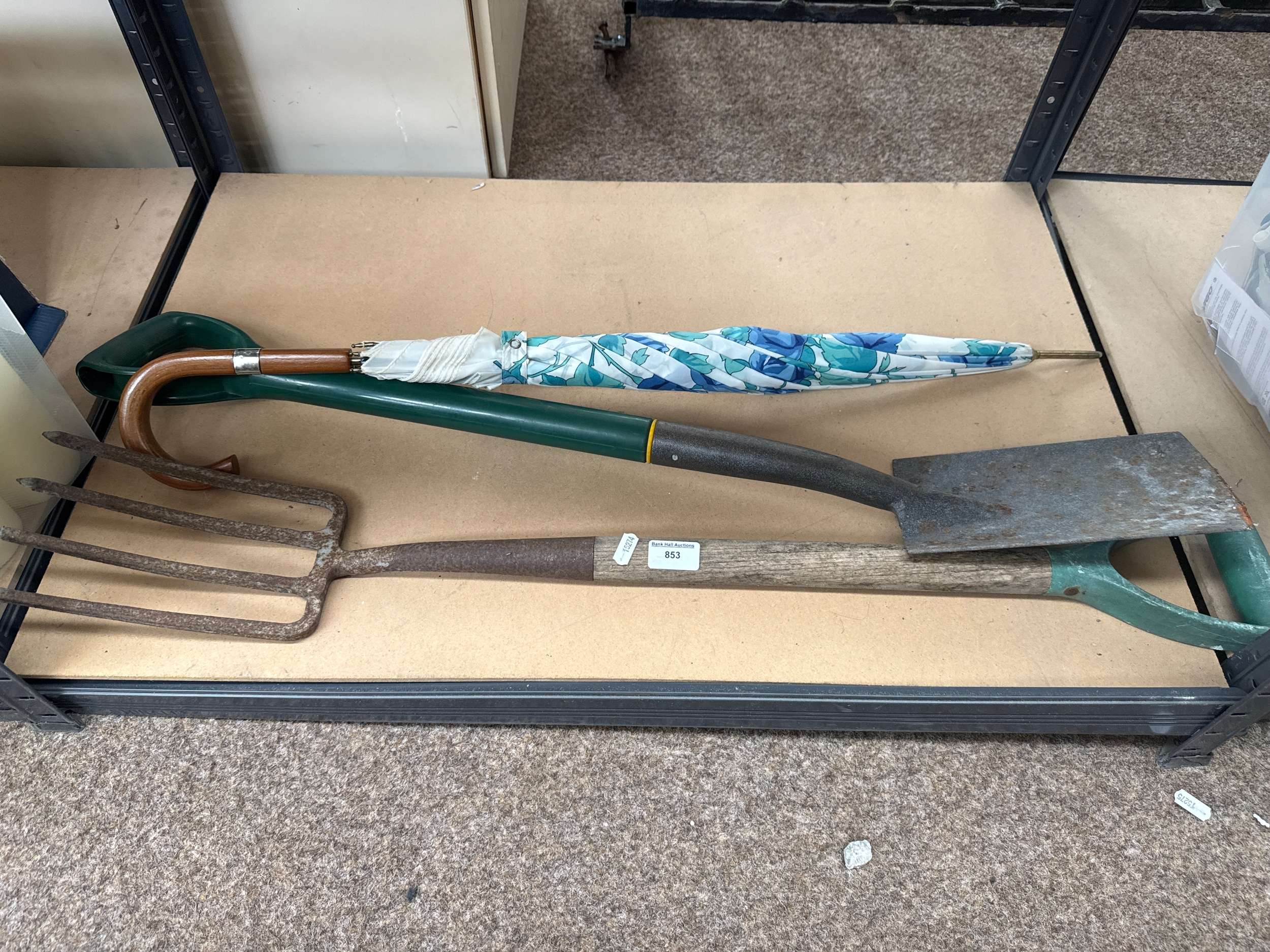 Shovel, rake and umbrella