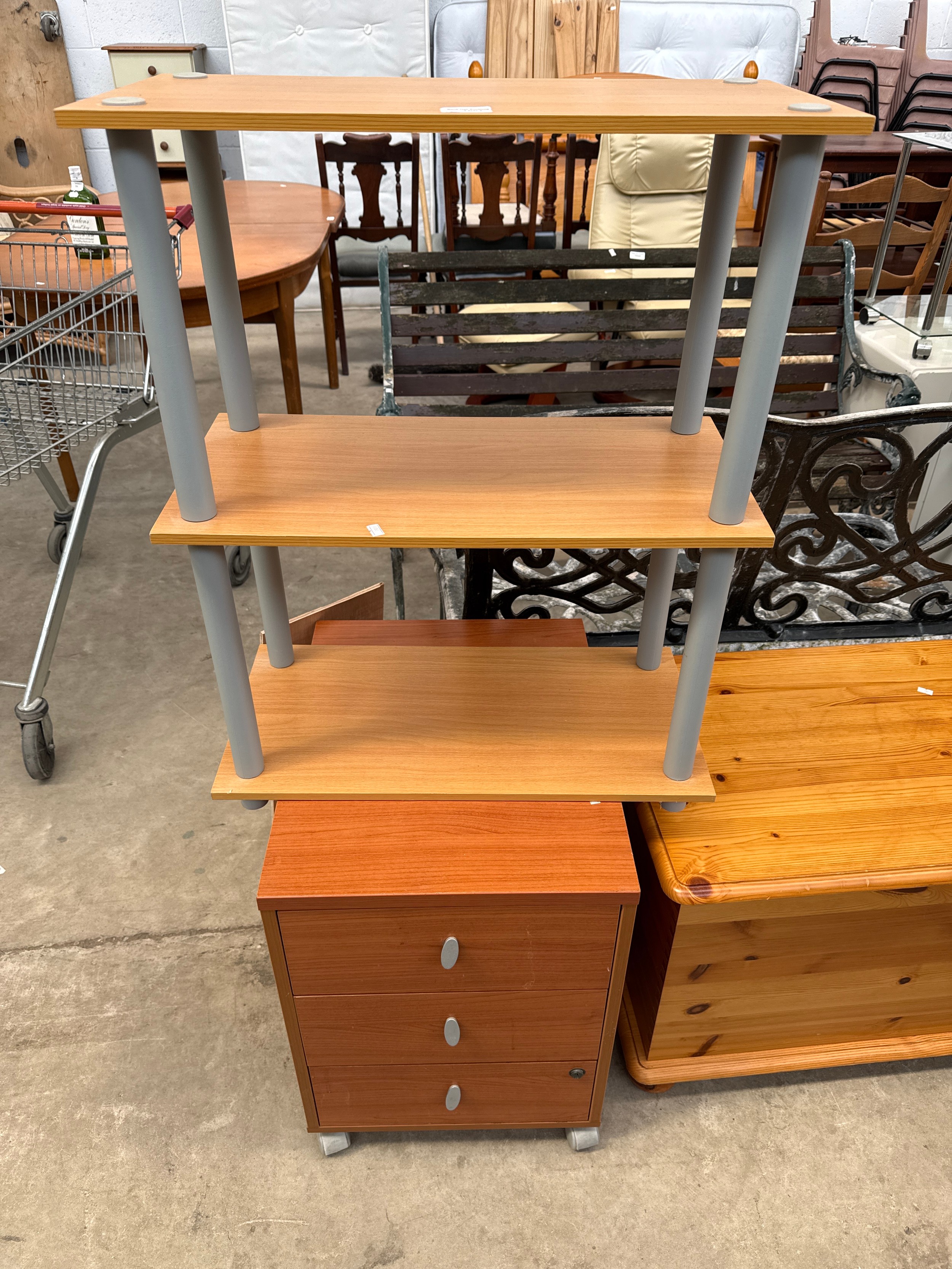 A small open shelf stand and a small 3 drawer chest