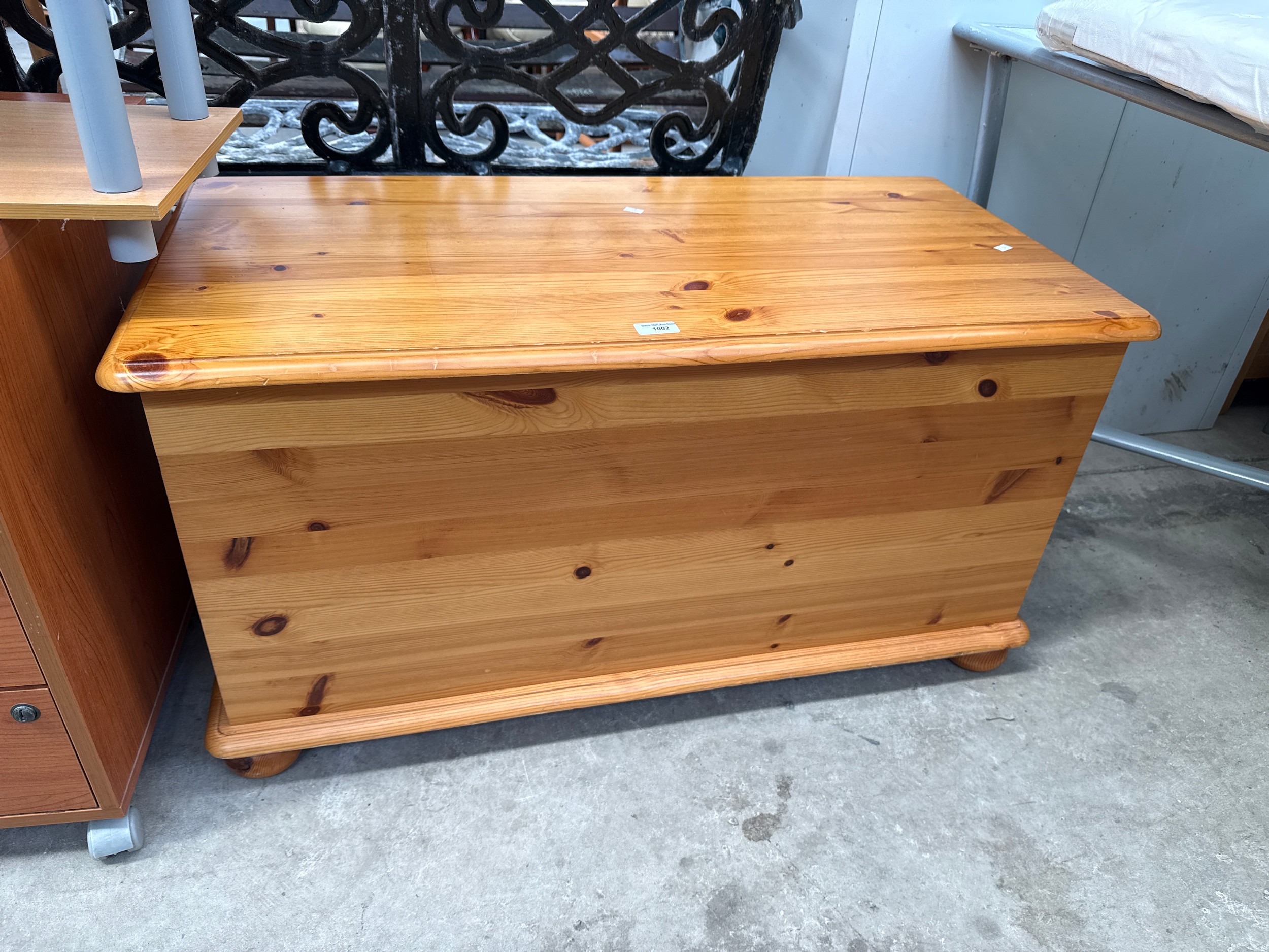 A pine lift top storage box
