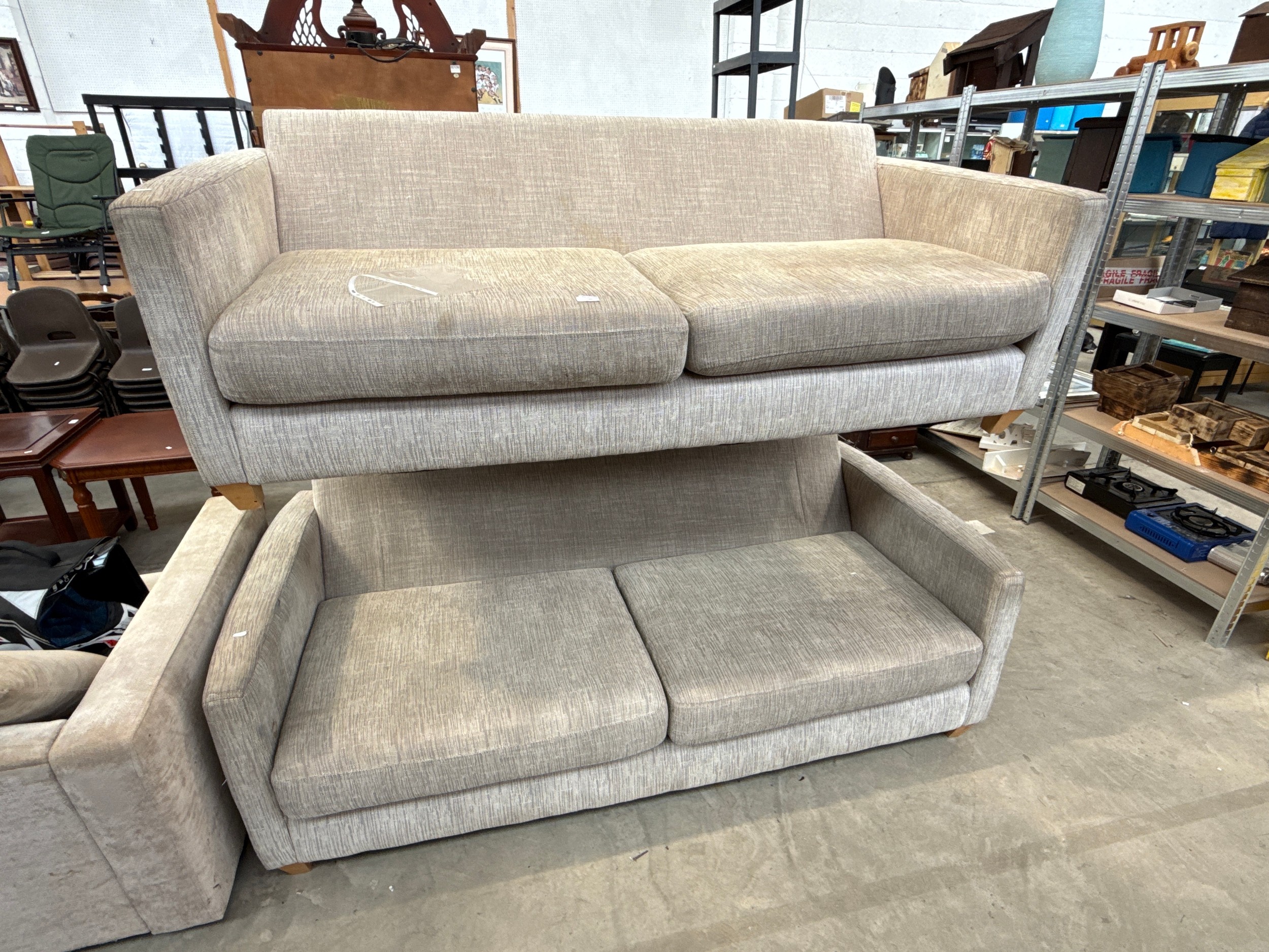 A pair of large upholstered settees