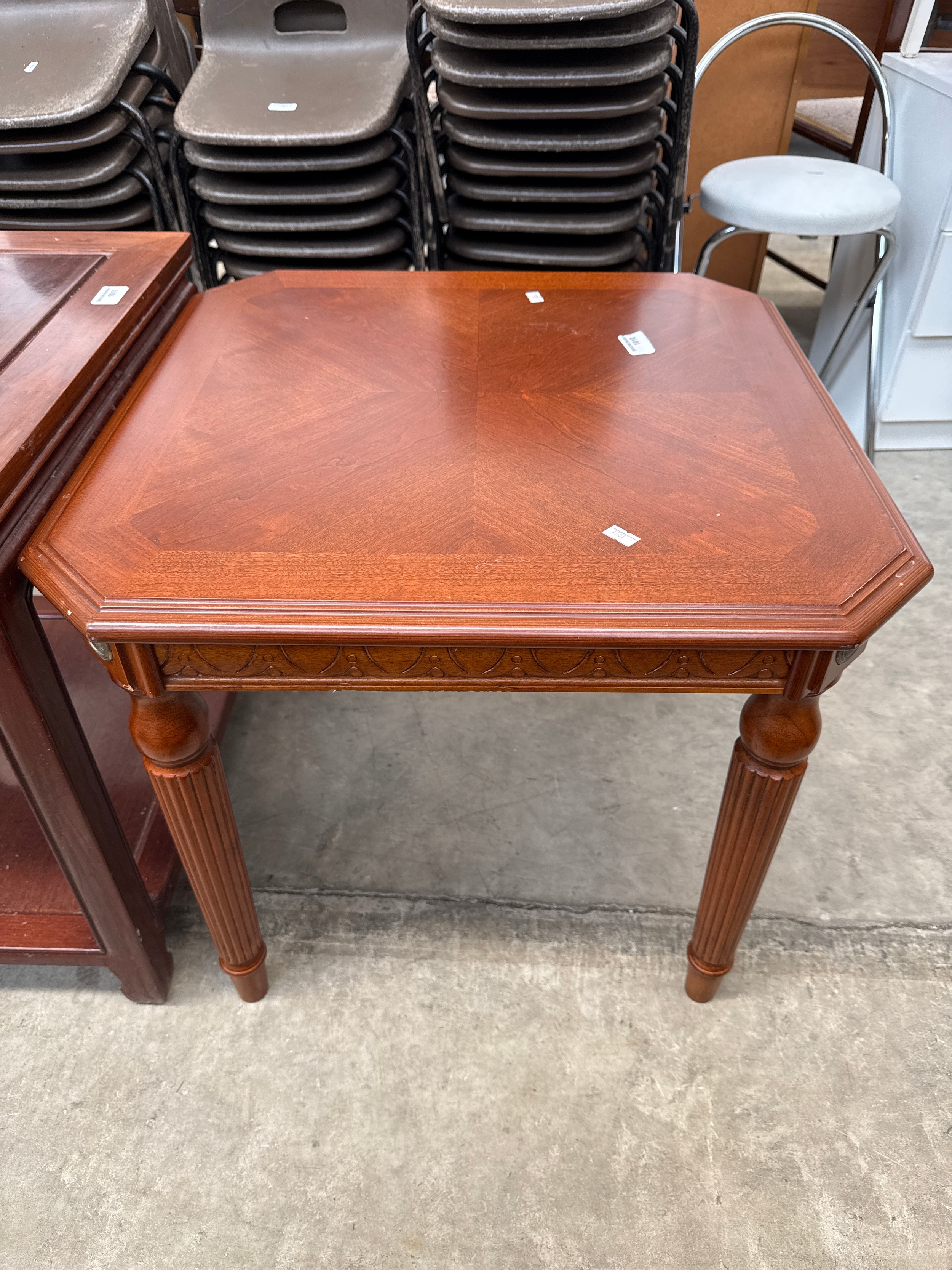 A vintage square coffee/lamp table on splined legs