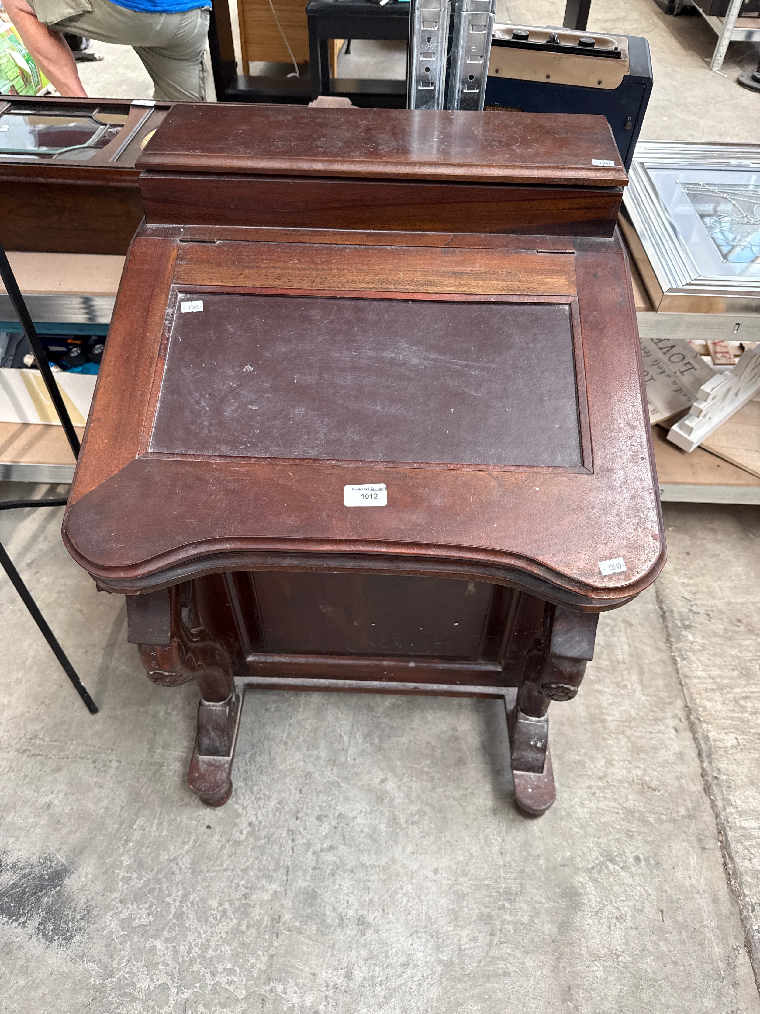 A vintage mahogany 8 drawer Davenport desk