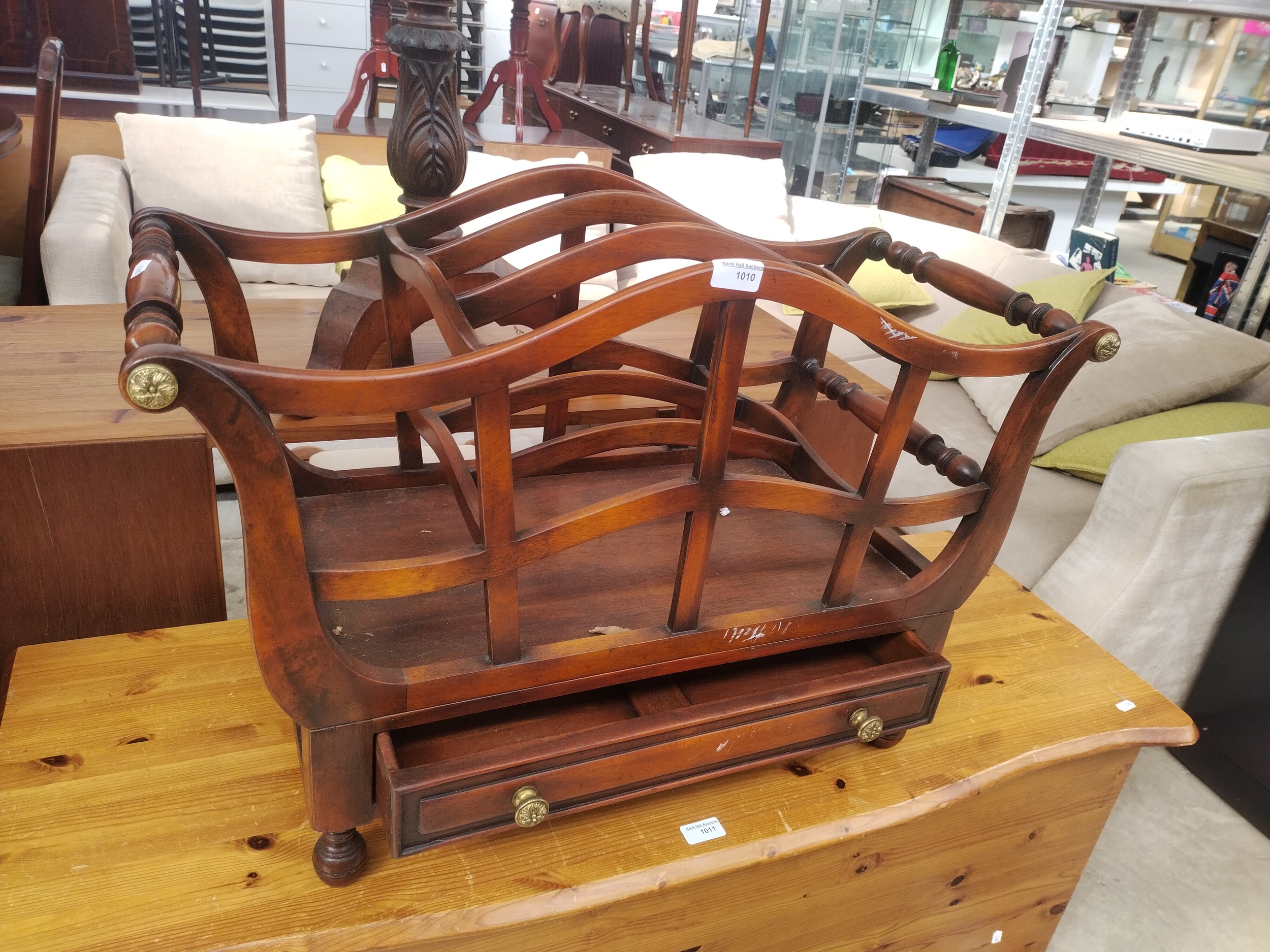 A vintage Canterbury magazine rack with lower drawer