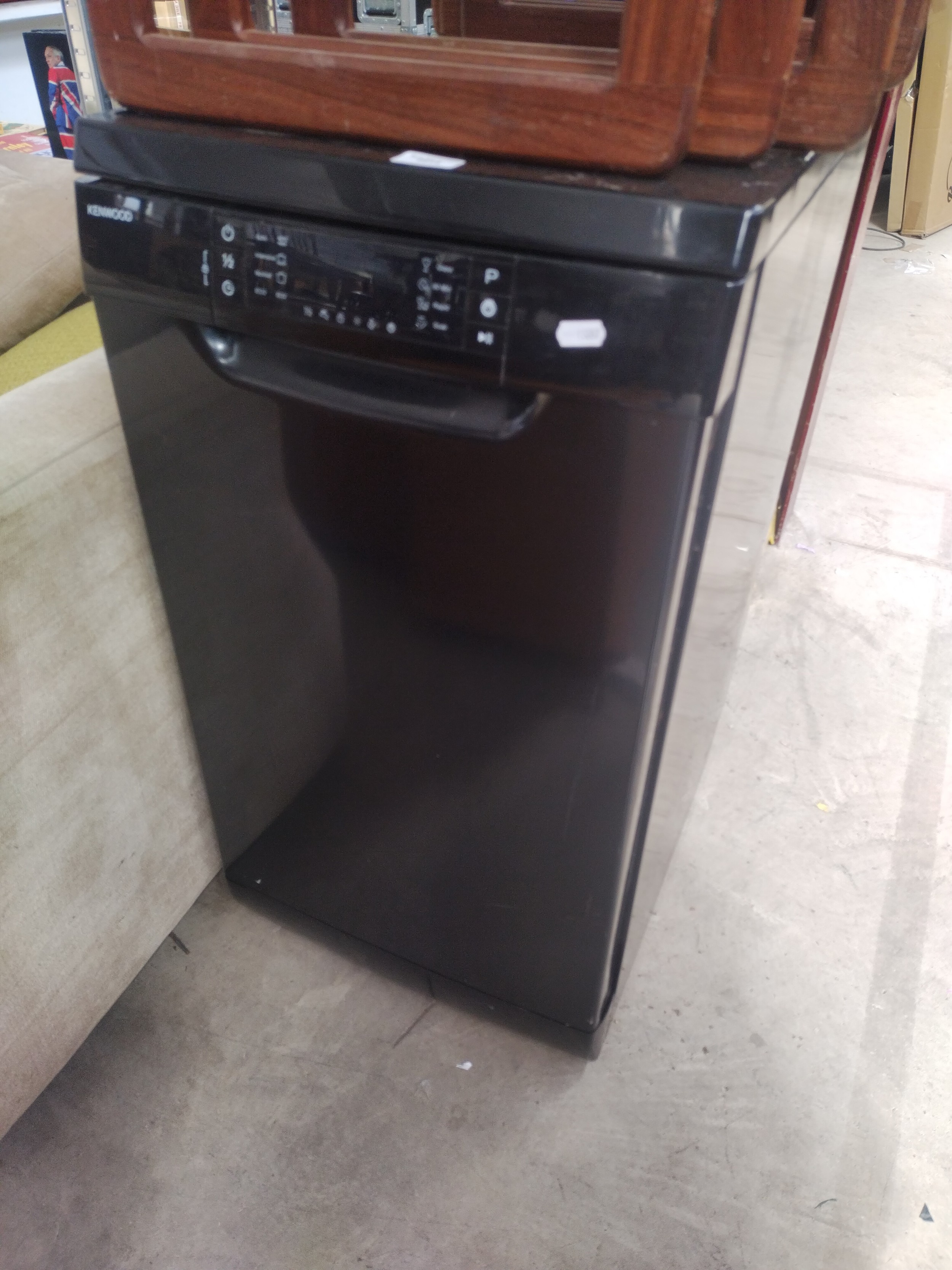 A small black KENWOOD dishwasher