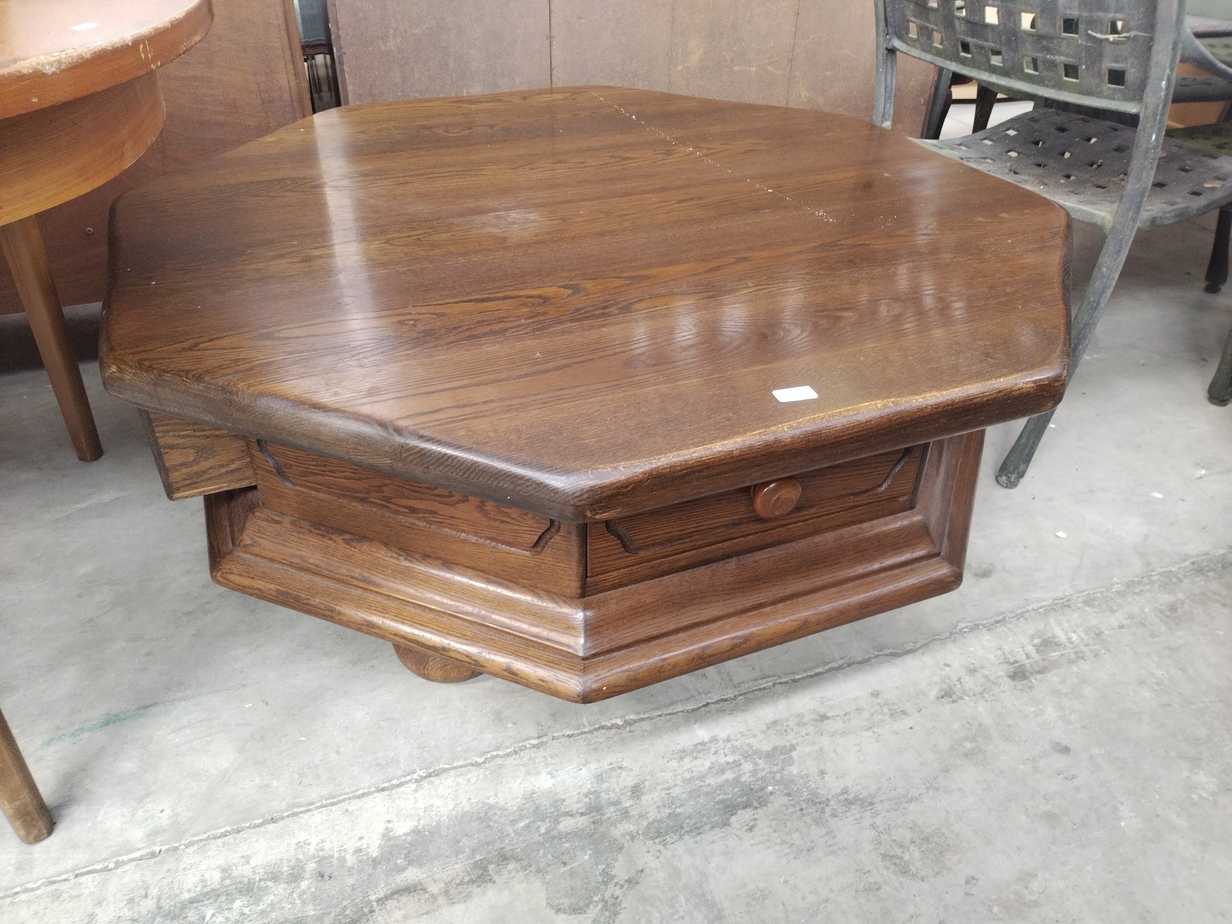 A large solid oak octagonal coffee table with 4 x lower drawers