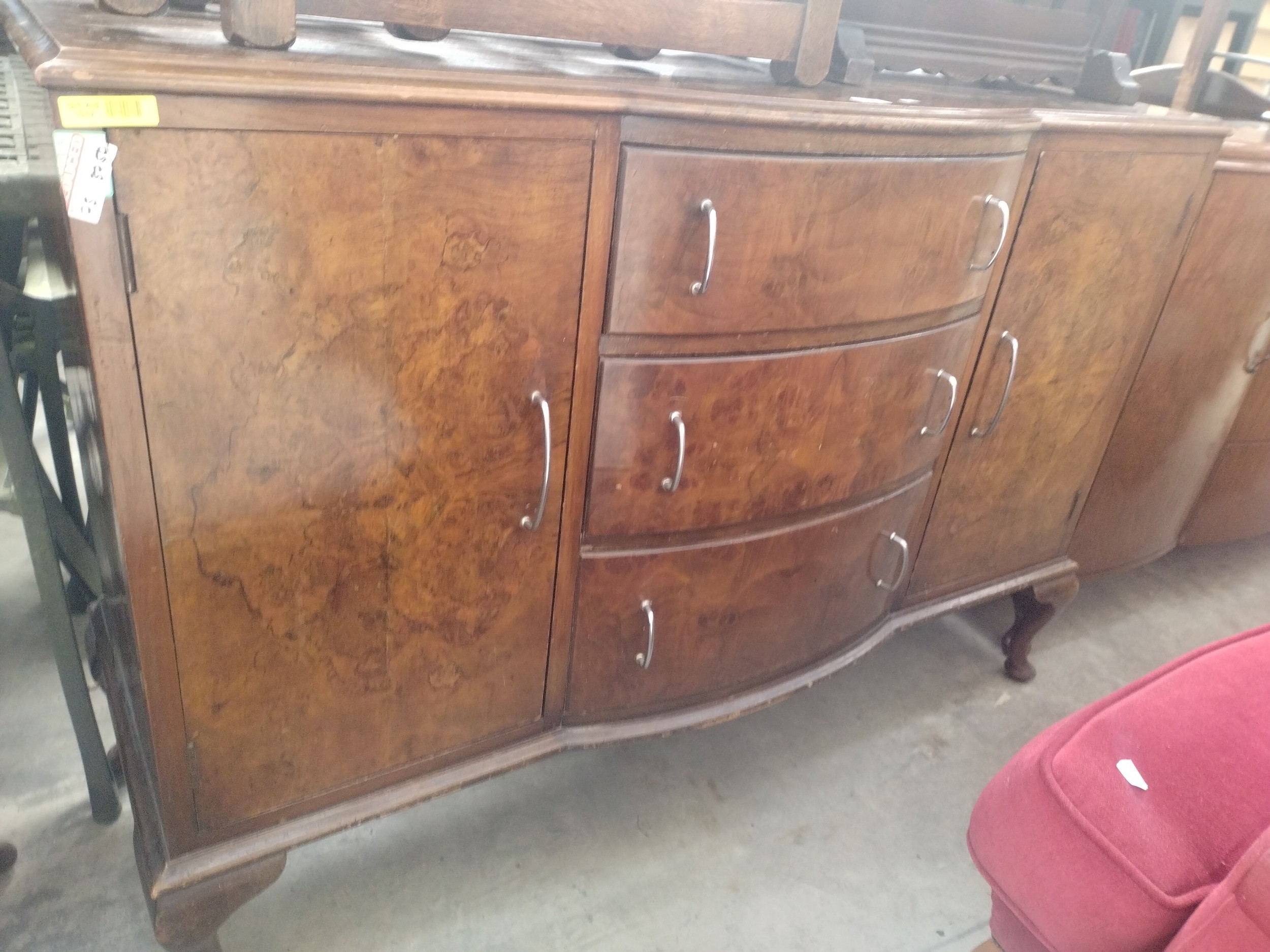 A large vintage 3 drawer walnut bow front sideboard